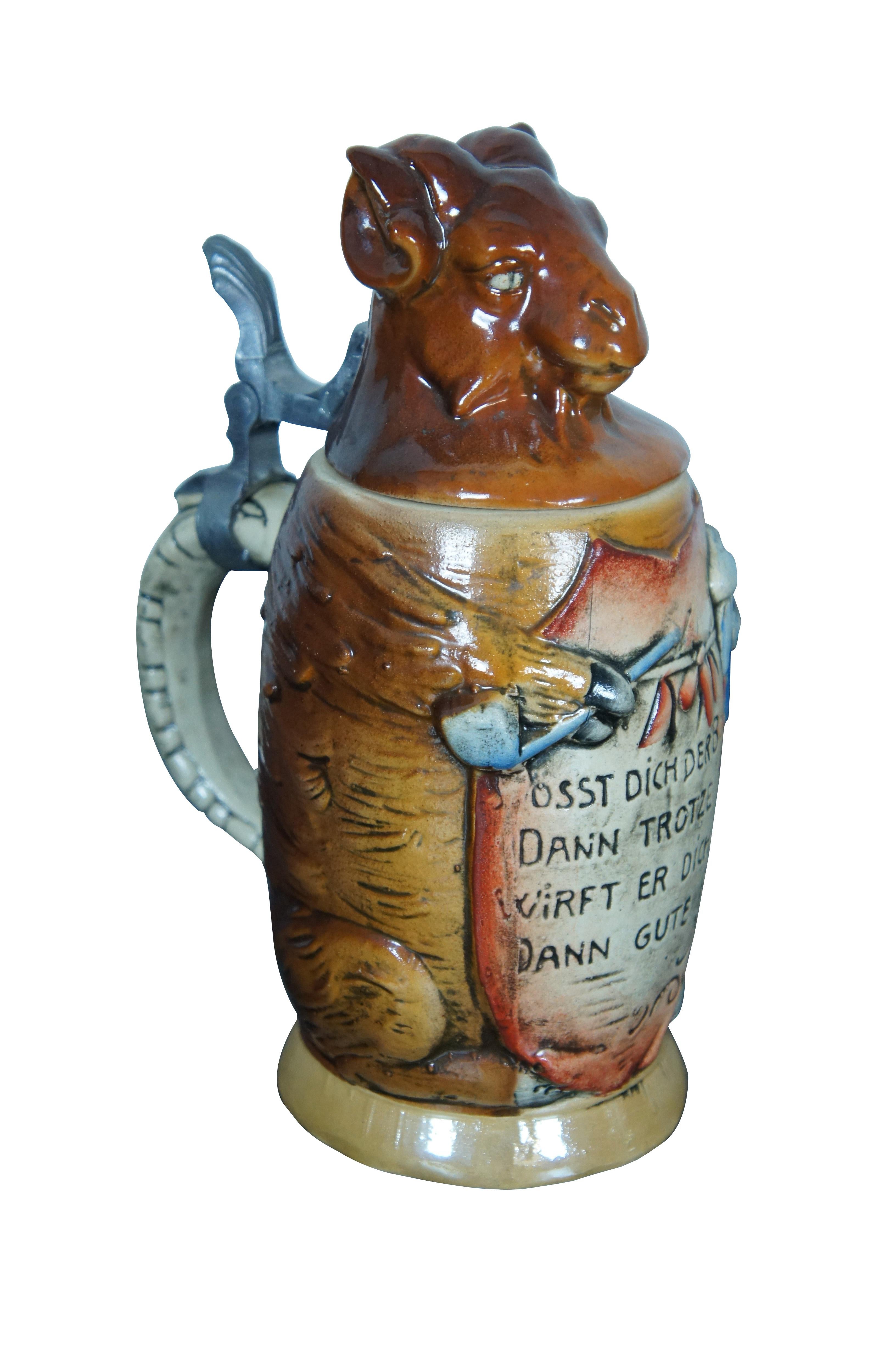 Pottery, figural, 0.5L (circa 1960).

Text:
ï¿½Stï¿½sst dich der Bock, dann trotze du,
wirft er dich um, dann gute Ruh!ï¿½
(If the bock hits you, then resist,
if it throws you, then rest well!)

The ram, or Bock, is the German symbol for Bockbier, a
