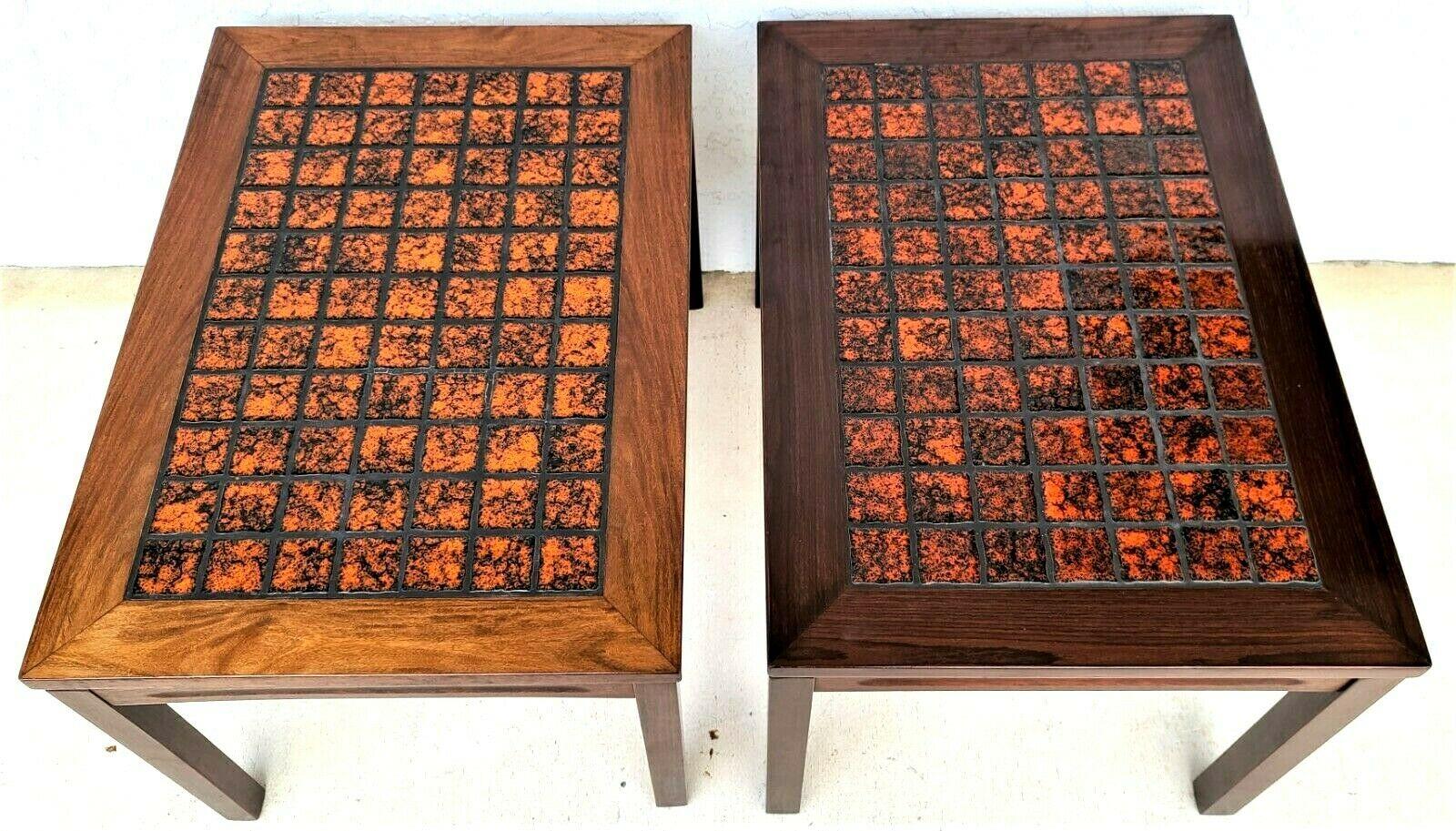 For FULL item description be sure to click on CONTINUE READING at the bottom of this listing.

Offering One Of Our Recent Palm Beach Estate Fine Furniture Acquisitions Of A Pair of Danish Modern Rosewood Mottled Fire Orange Tile Top Side End