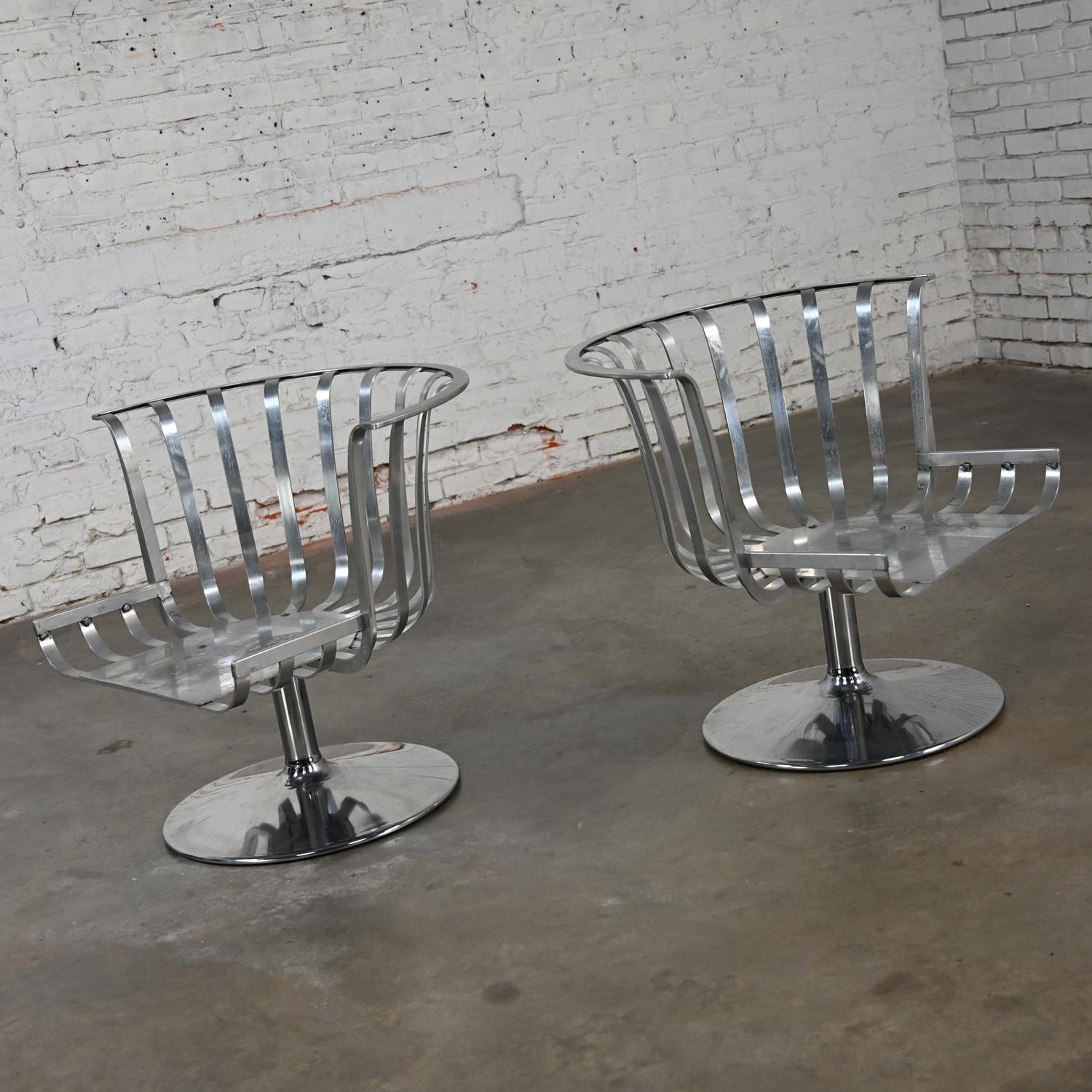 2 MCM Polished Aluminum Barrel Swivel Lounge Chairs Chrome Tulip Base by Woodard For Sale 6