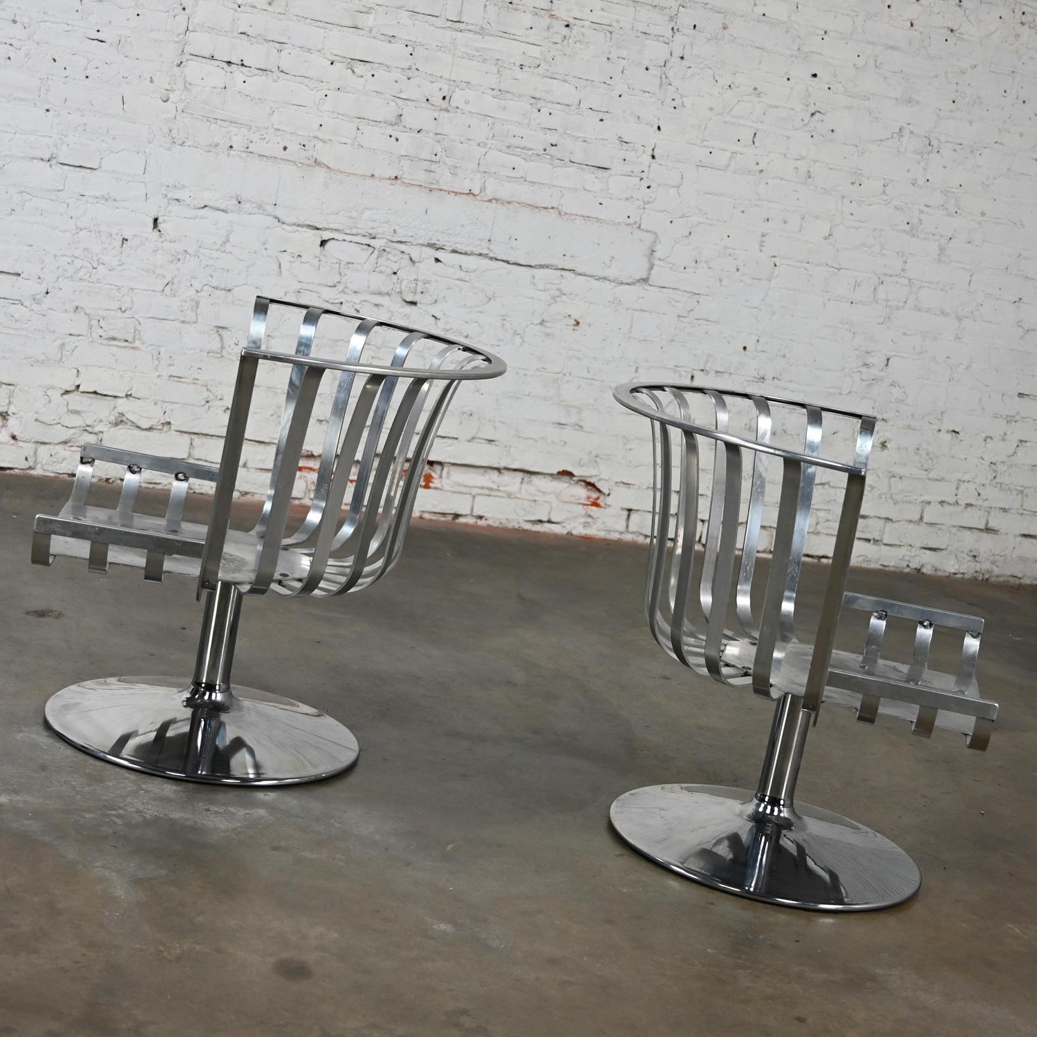 2 MCM Polished Aluminum Barrel Swivel Lounge Chairs Chrome Tulip Base by Woodard For Sale 7