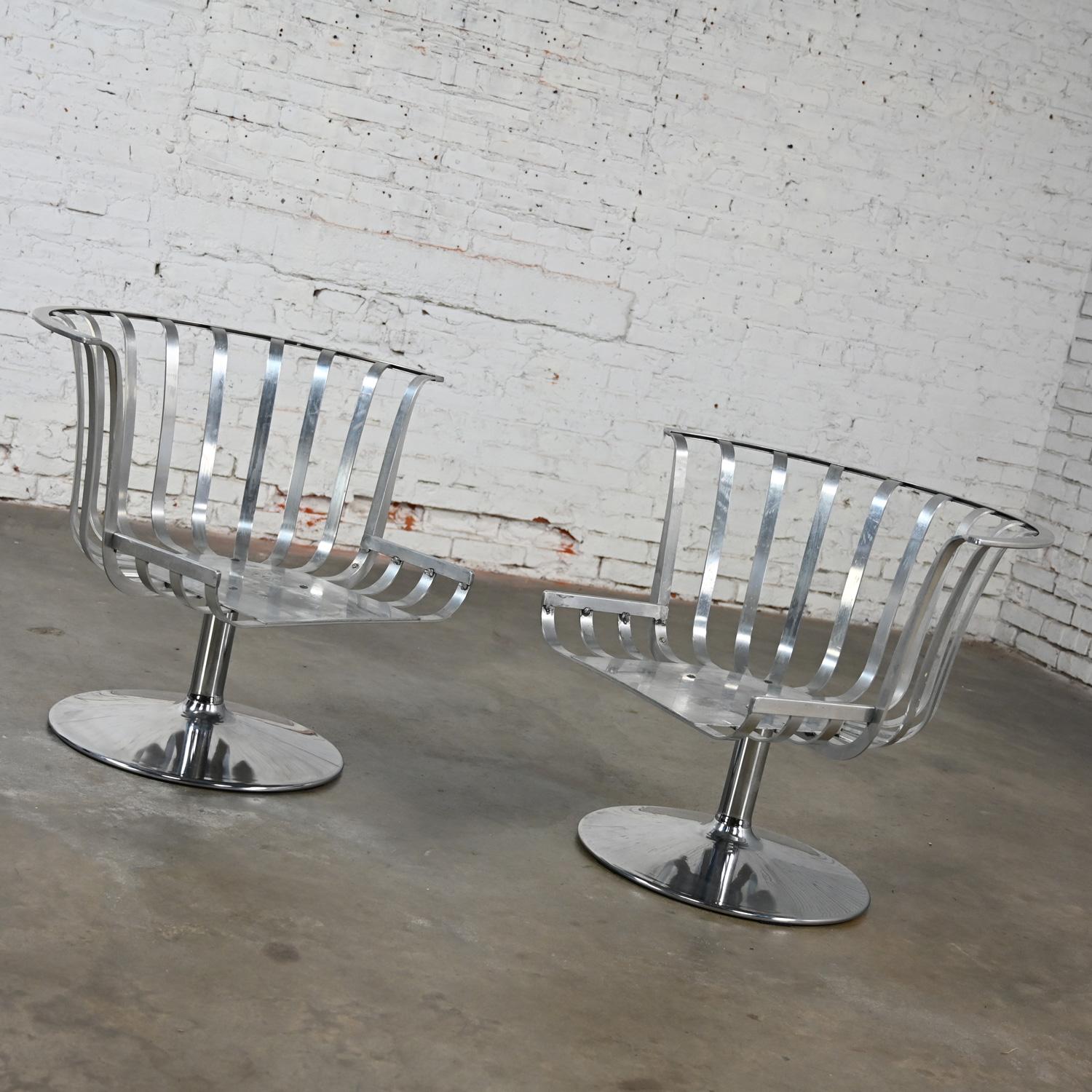 2 MCM Polished Aluminum Barrel Swivel Lounge Chairs Chrome Tulip Base by Woodard For Sale 9