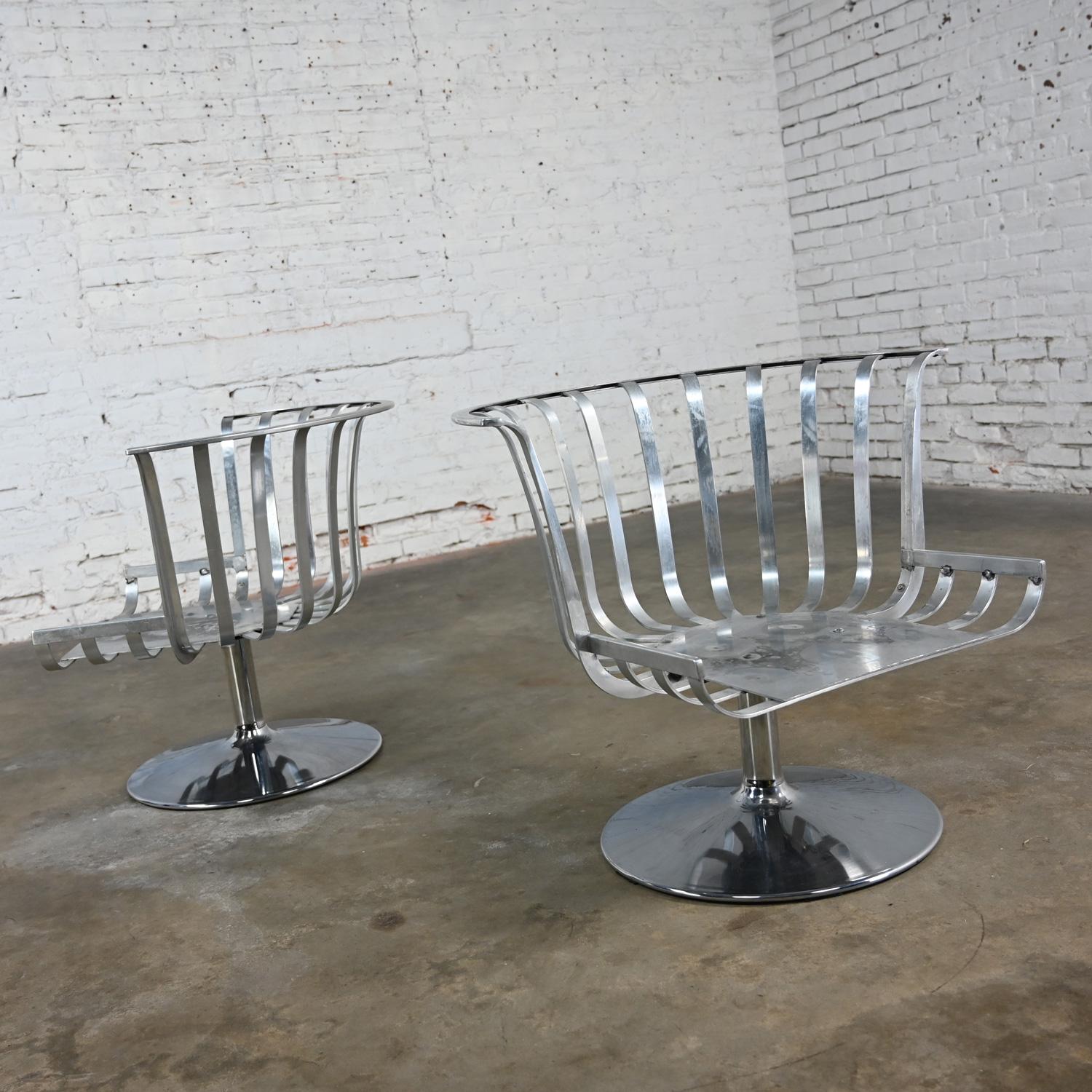 2 MCM Polished Aluminum Barrel Swivel Lounge Chairs Chrome Tulip Base by Woodard For Sale 10
