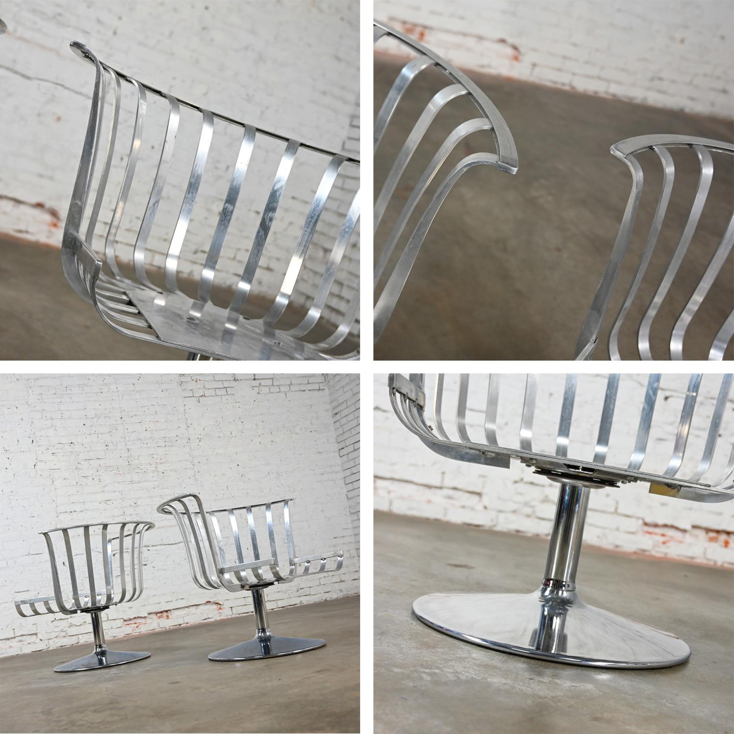 2 MCM Polished Aluminum Barrel Swivel Lounge Chairs Chrome Tulip Base by Woodard For Sale 12