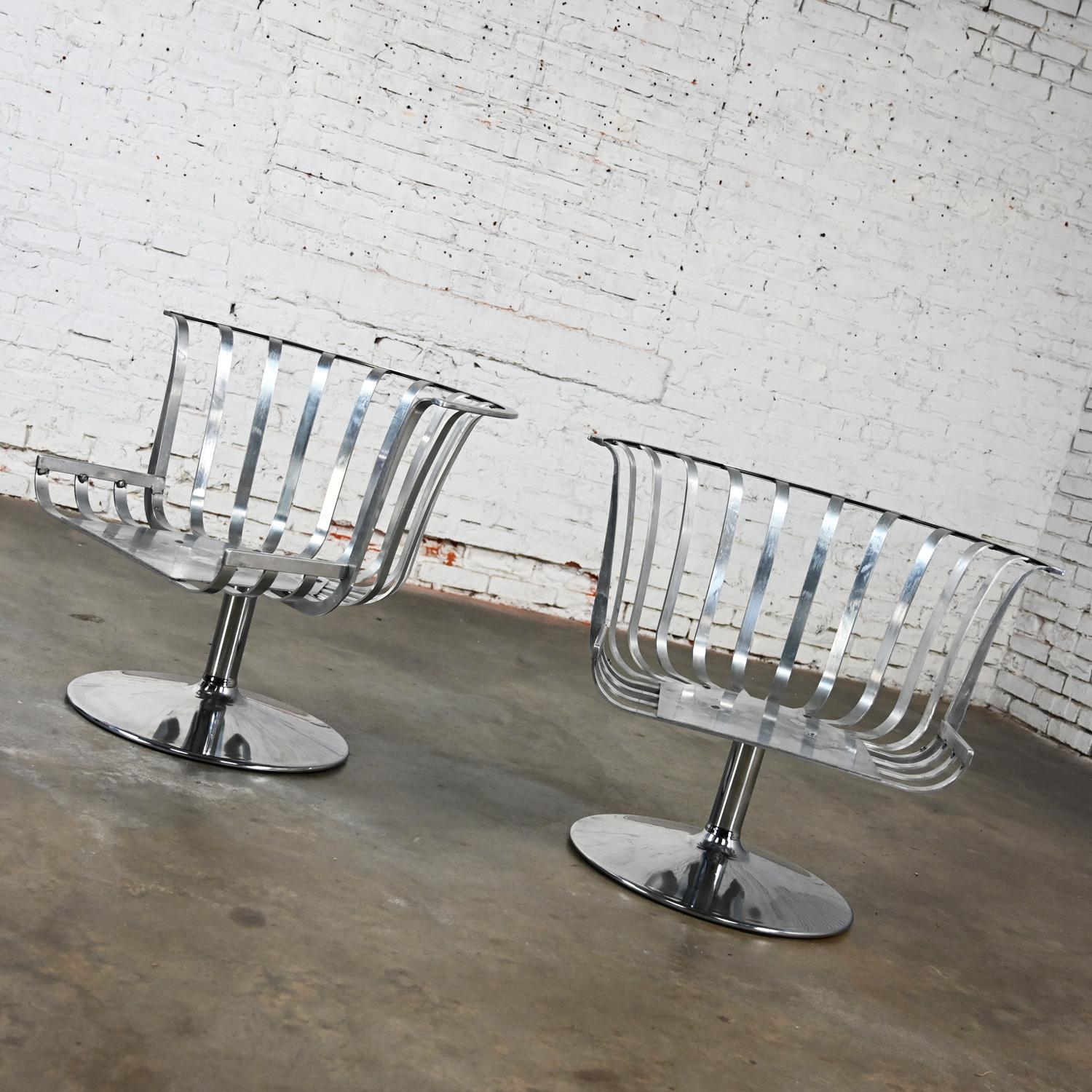 2 MCM Polished Aluminum Barrel Swivel Lounge Chairs Chrome Tulip Base by Woodard For Sale 1