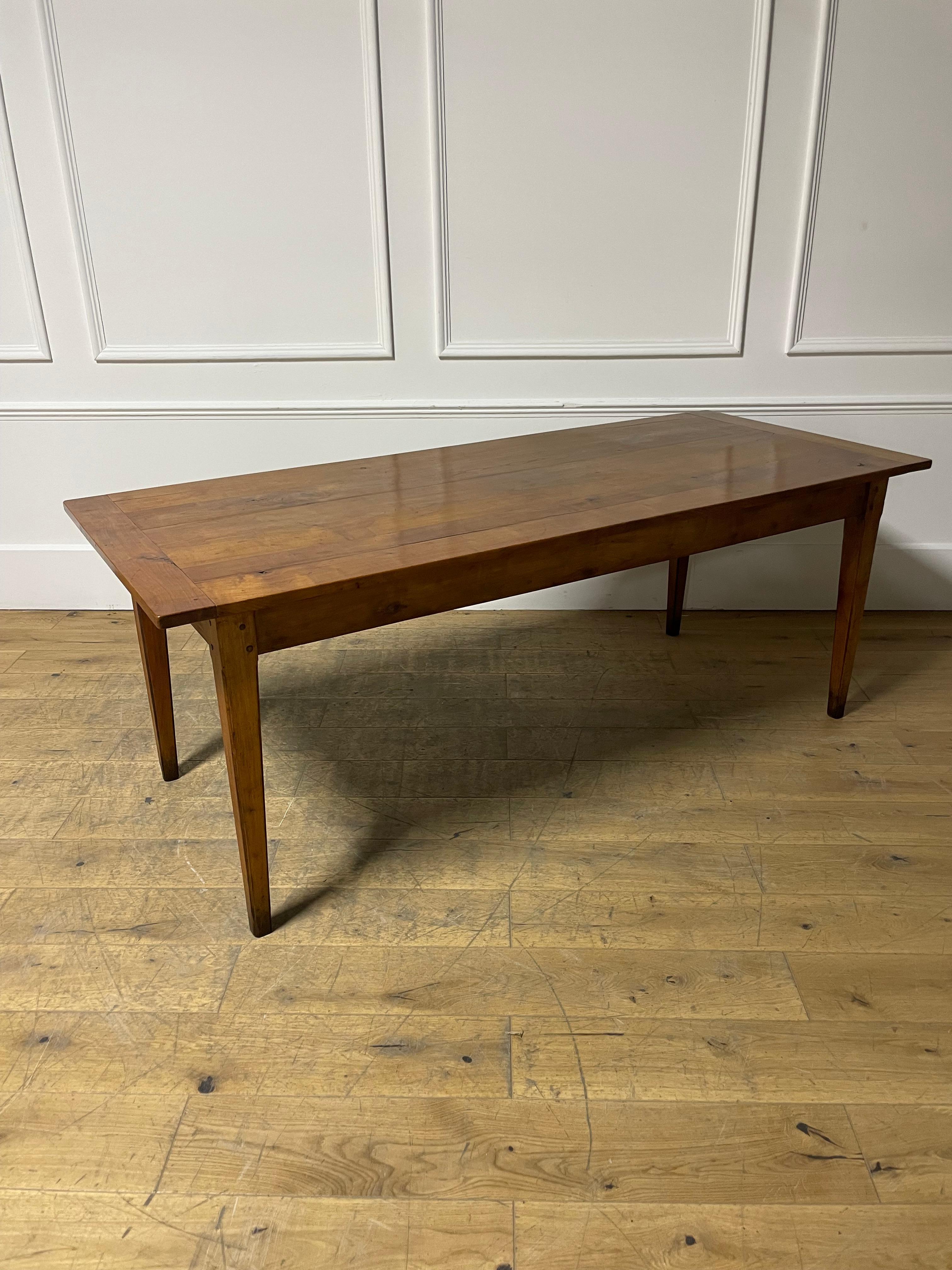 Charming 19th century cherry wood farmhouse table 

French circa 1870’s from the Normandy region 

Will seat 6/8 people 

200 cms long 
82 cms wide 
76 cms high

24 inches 61 cms under the rail 