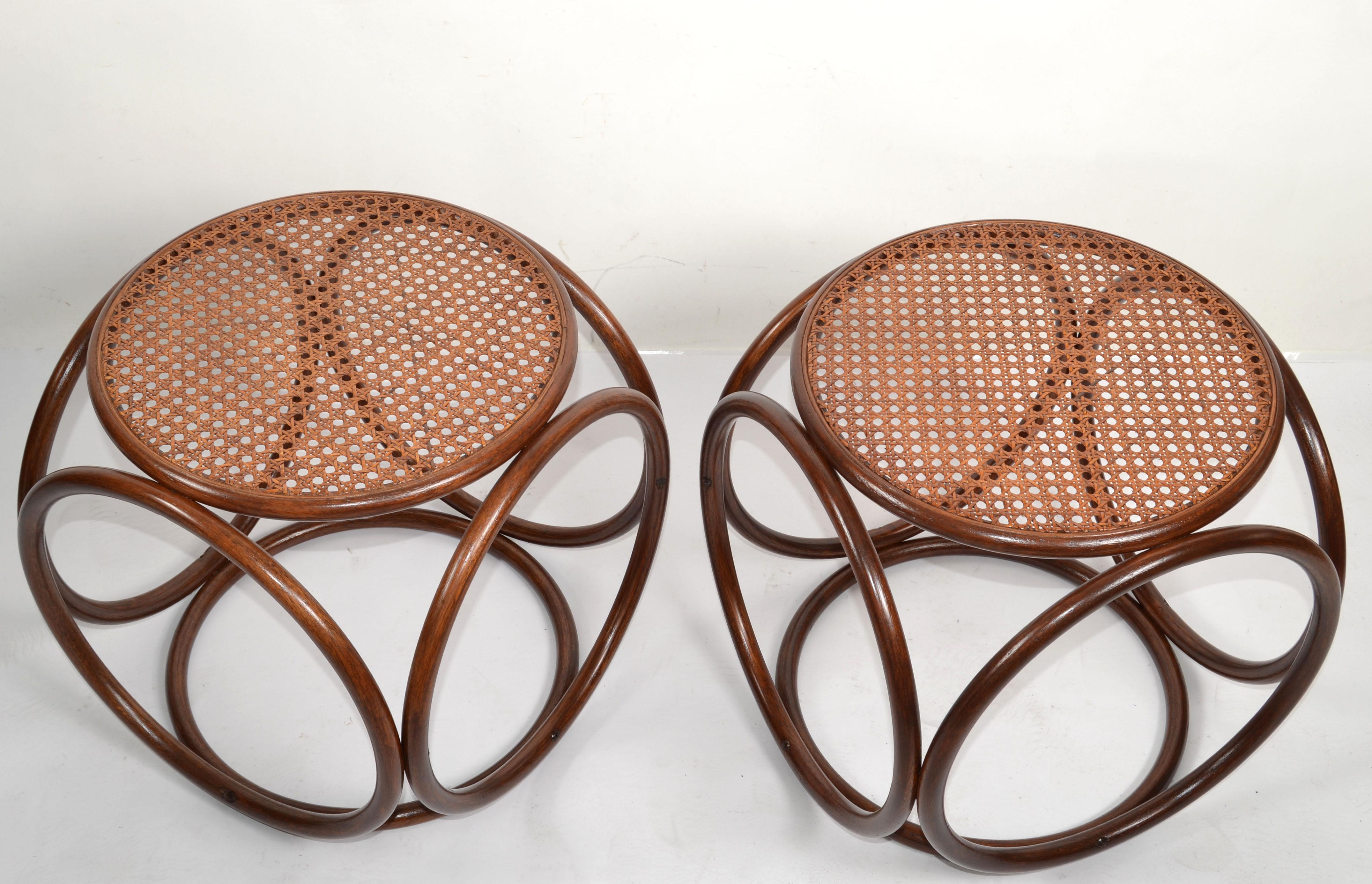 Pair of Michael Thonet attributed classic and timeless Mid-Century Modern bentwood and cane stool, ottoman, side table, drinks table or end table made in Europe, Austria.
All rustic handwoven bentwood and wicker cane top stool or side drinks