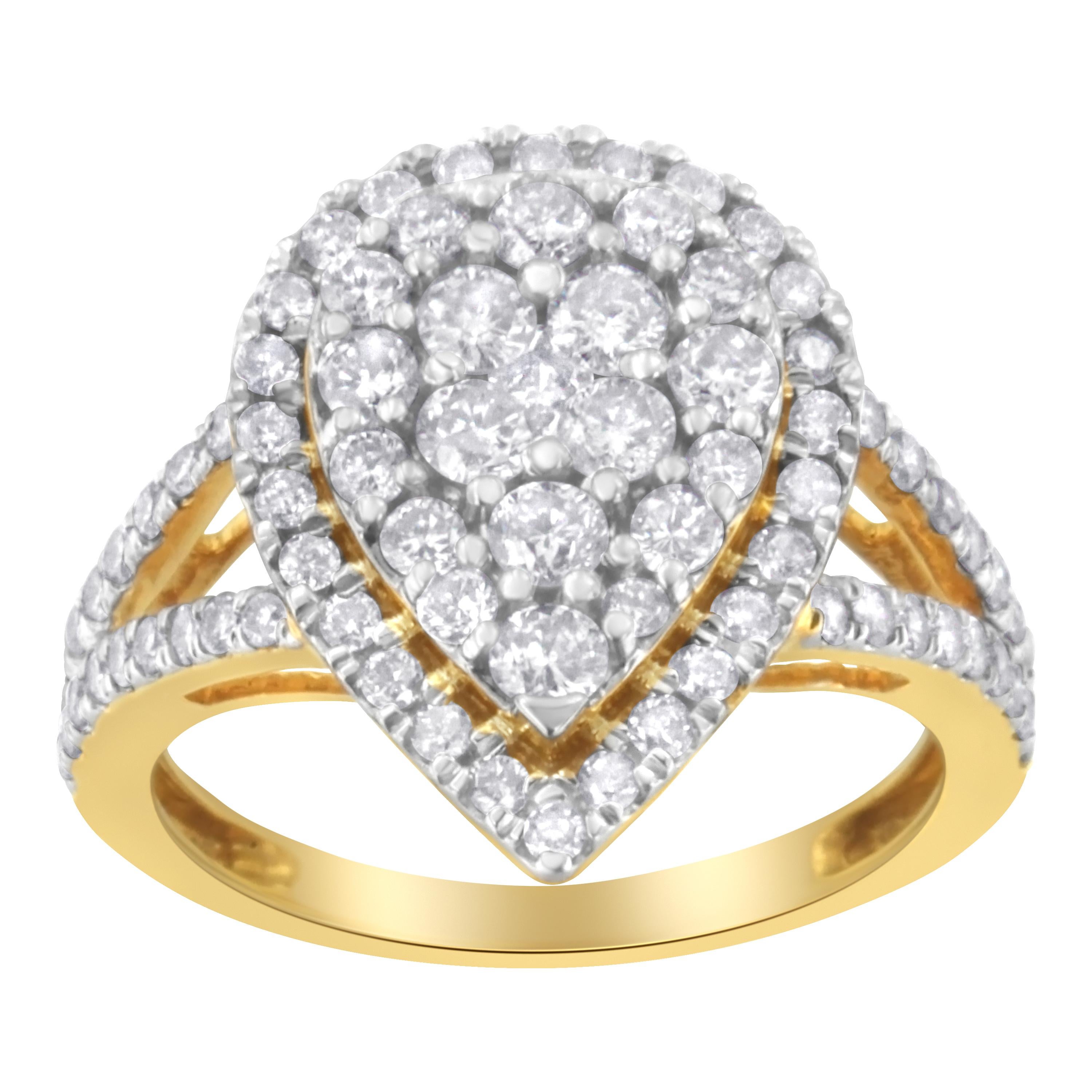 Ein kühner Silber- und Diamant-Cluster-Ring. Dieser birnenförmige Ring ist mit 80 Diamanten im Rundschliff in einer Zackenfassung mit einem Gesamtgewicht von 1 1/2 Karat besetzt. Die Diamanten sind in vergoldetes Sterlingsilber