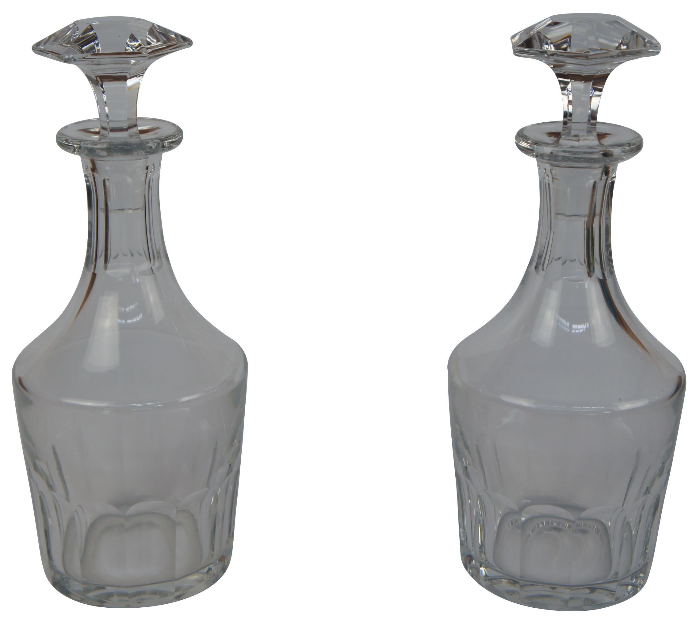 2 mid century Baccarat crystal decanters in the Bretagne pattern, made in France.

Baccarat introduced the Bretagne pattern in 1954 .
The pattern features a classic design of deep- cut panels circling the bowl. Bretagne is French for Brittany, a