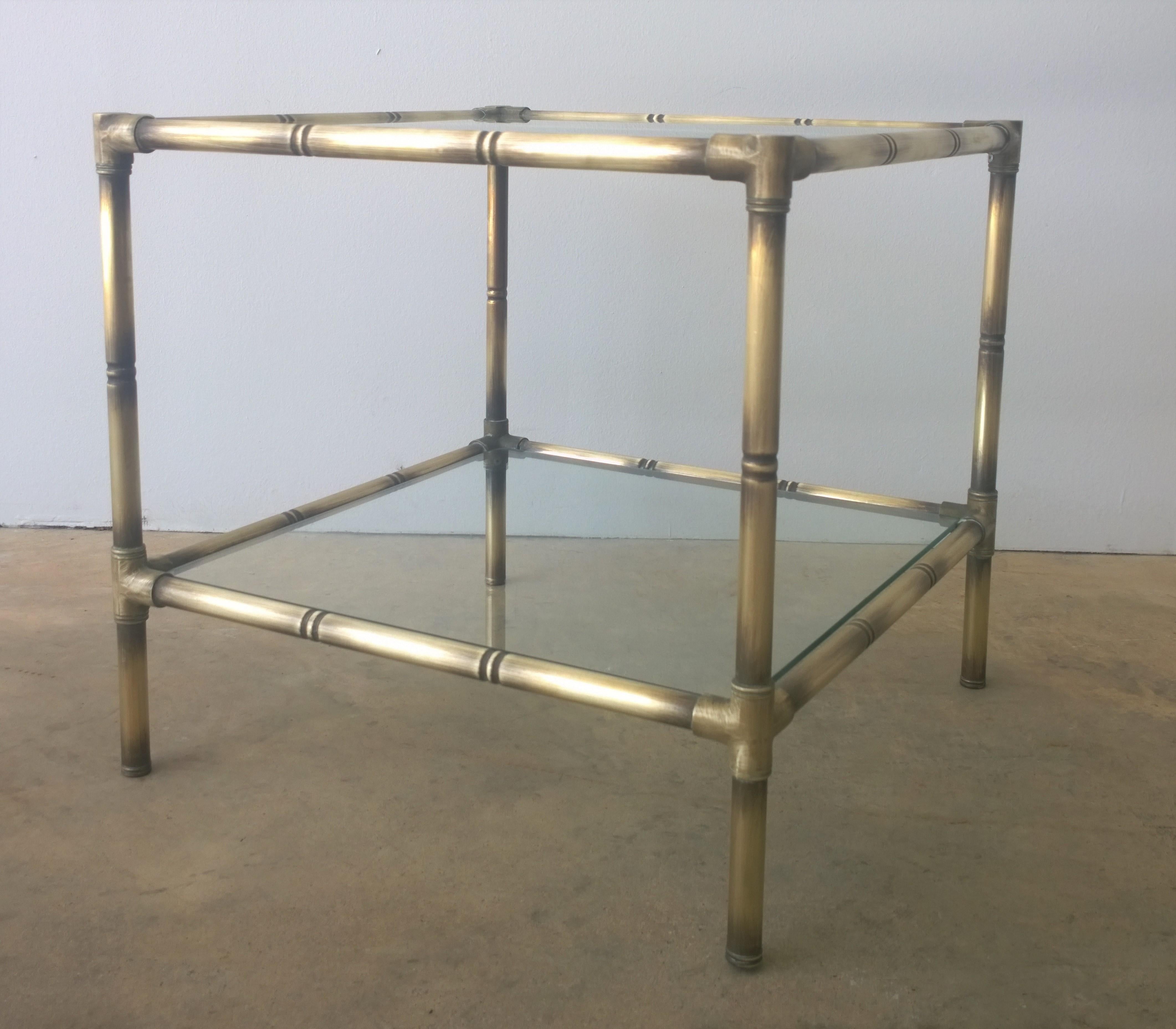 Offered are a set of two Mid-Century Modern Argentinian brushed brass faux bamboo and glass petite side / end / occasional tables. These little gems are quite lovely and uncomplicated. They would make a great addition to a space requiring pieces