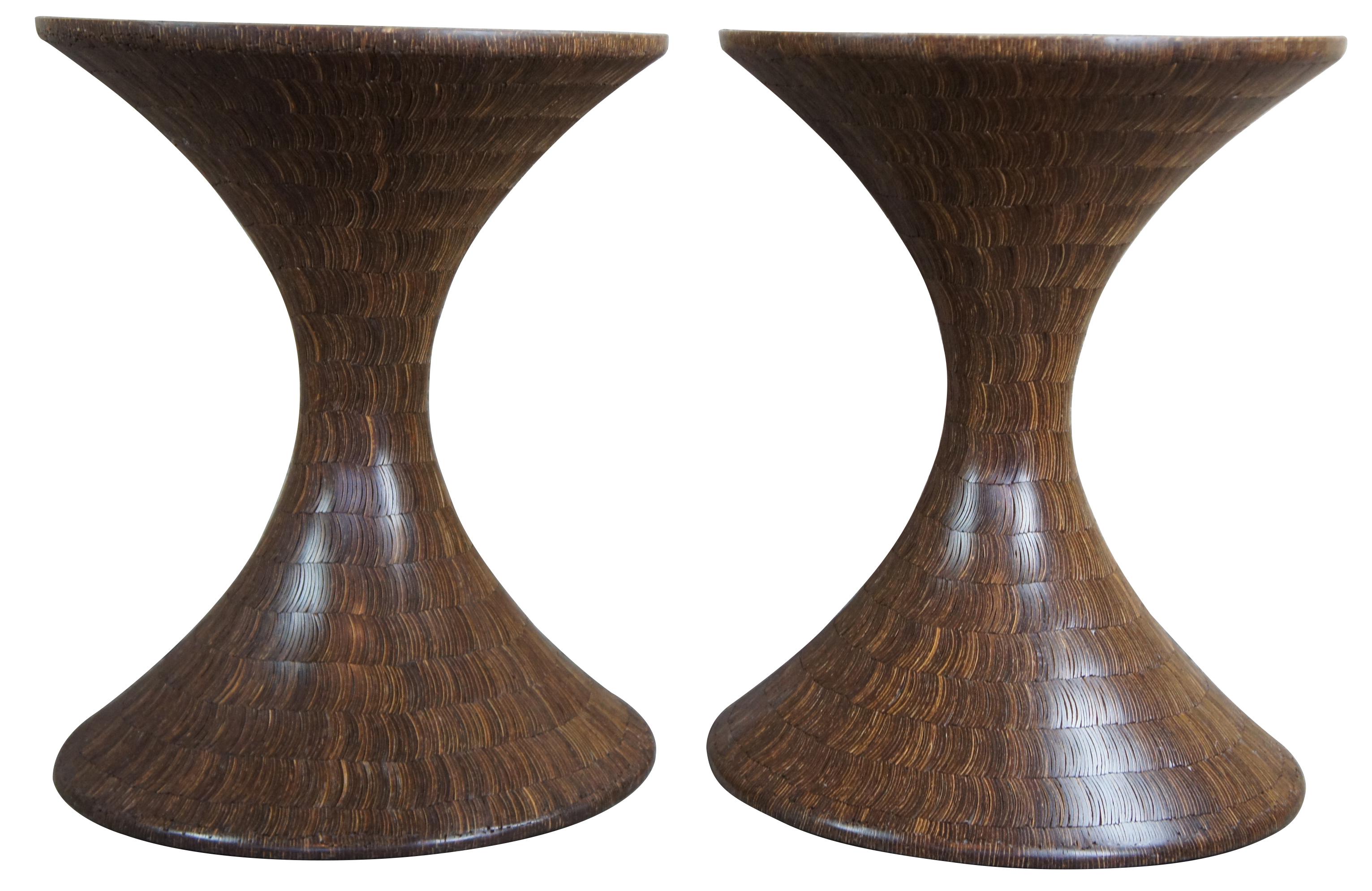 2 Mid-Century Modern Hourglass shaped sculptural pedestal side tables boho chic

Unique pair of hourglass shaped pedestals or side tables. Each is made from inlaid slivers that are patterned in a swirl shape and lead to a painted top, affixed with