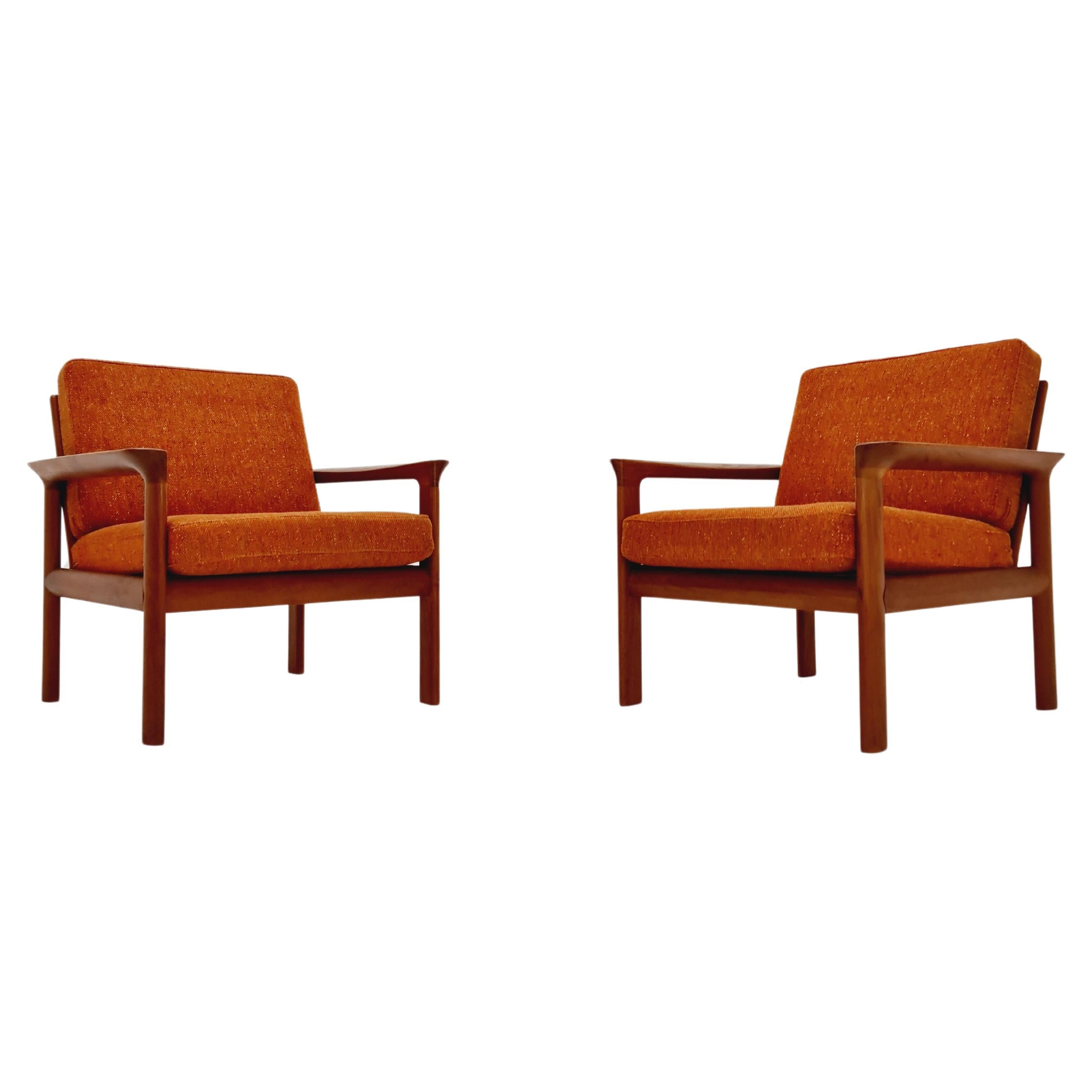 2 Mid century teak easy lounge / arm chairs by Sven Ellekaer for Komfort For Sale