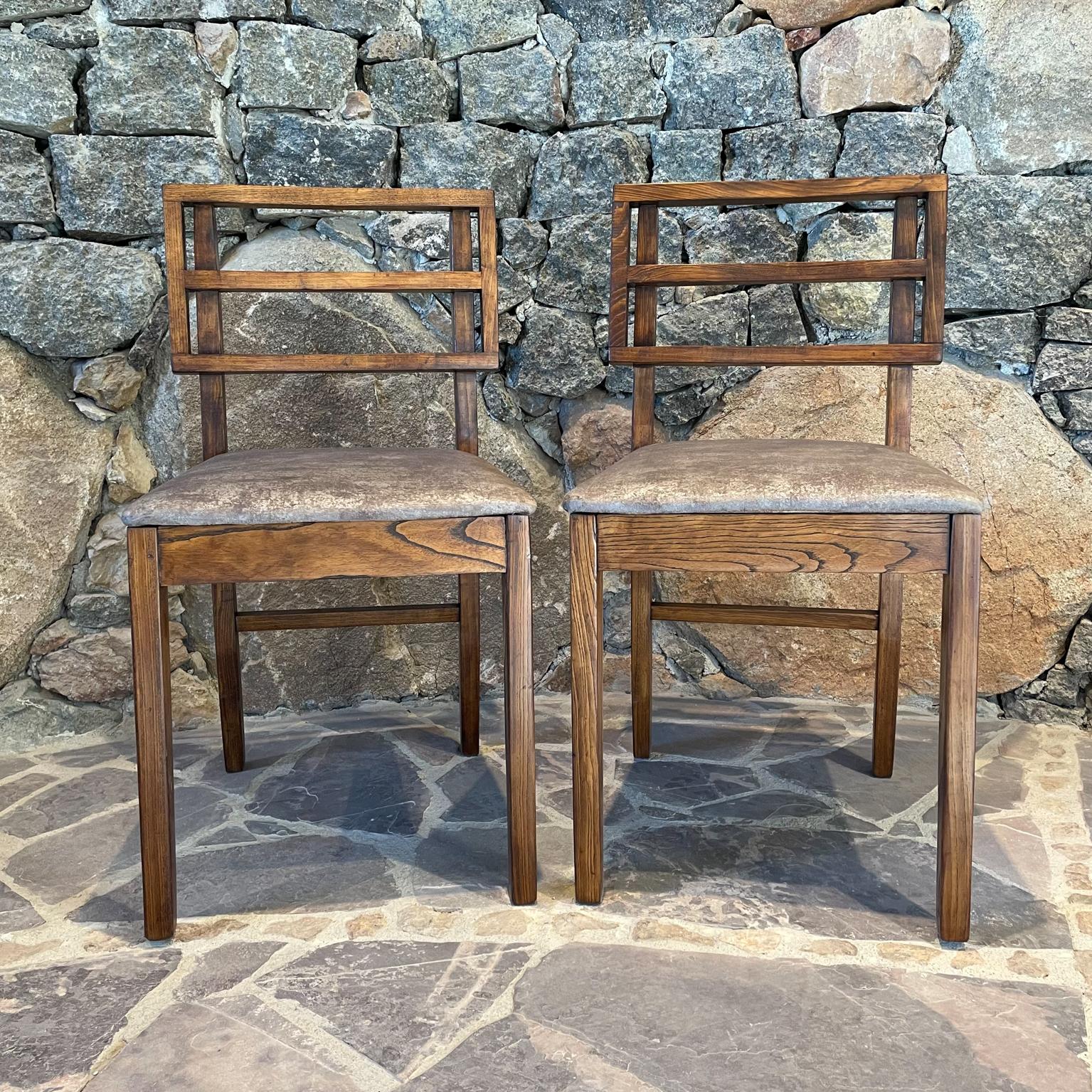 Chairs
Modern pair of side chairs in oak wood style of Paul Laszlo USA 1960s
Unmarked. Selling as a pair.
Measures: 31.5 H x 17 W x 18.75 D Seat: H 18 inches
Original vintage condition preowned. Refinished. 
New gray textured upholstery, ready to