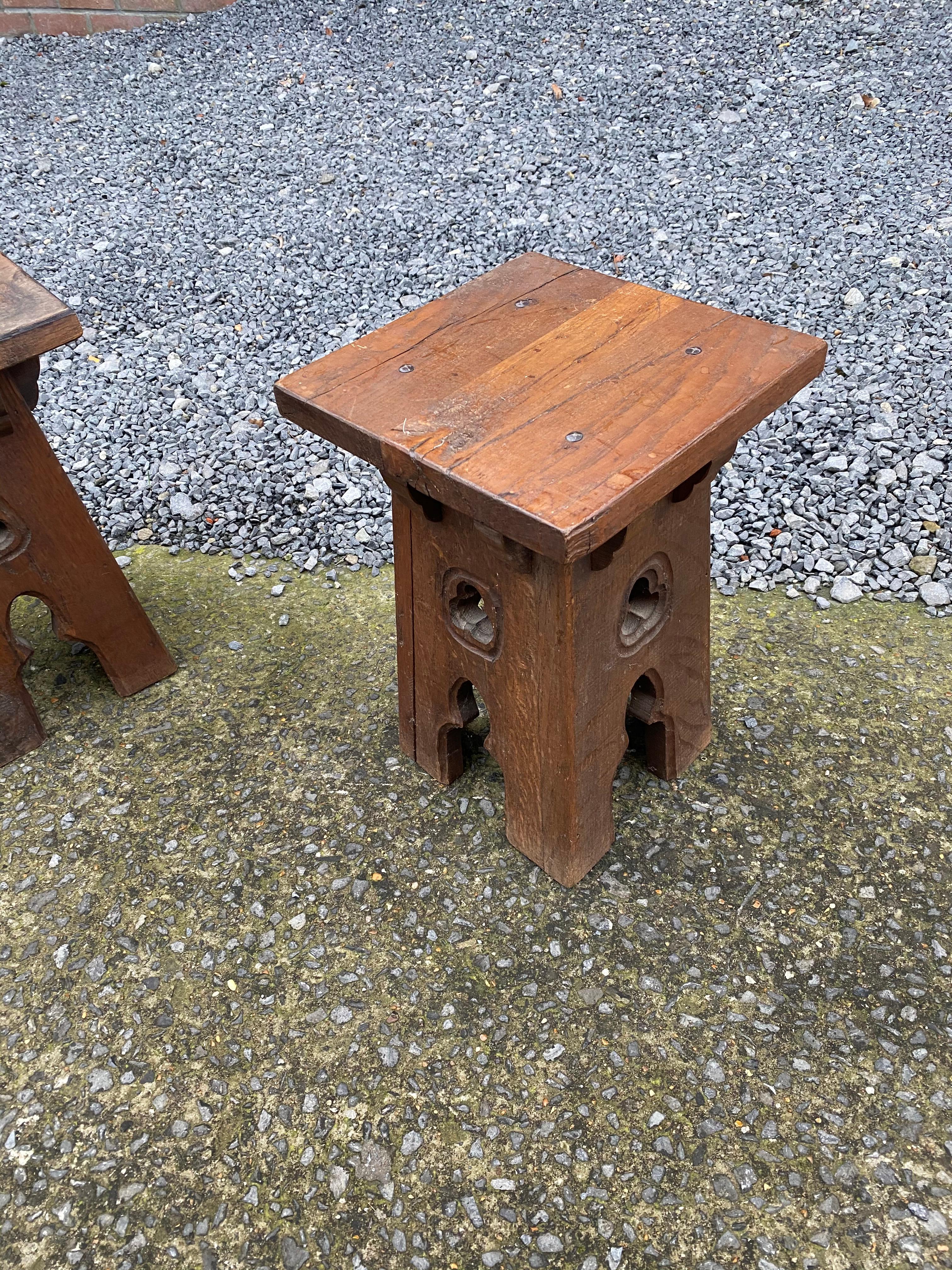 2 Neo Gothic style oak stools, circa 1950.