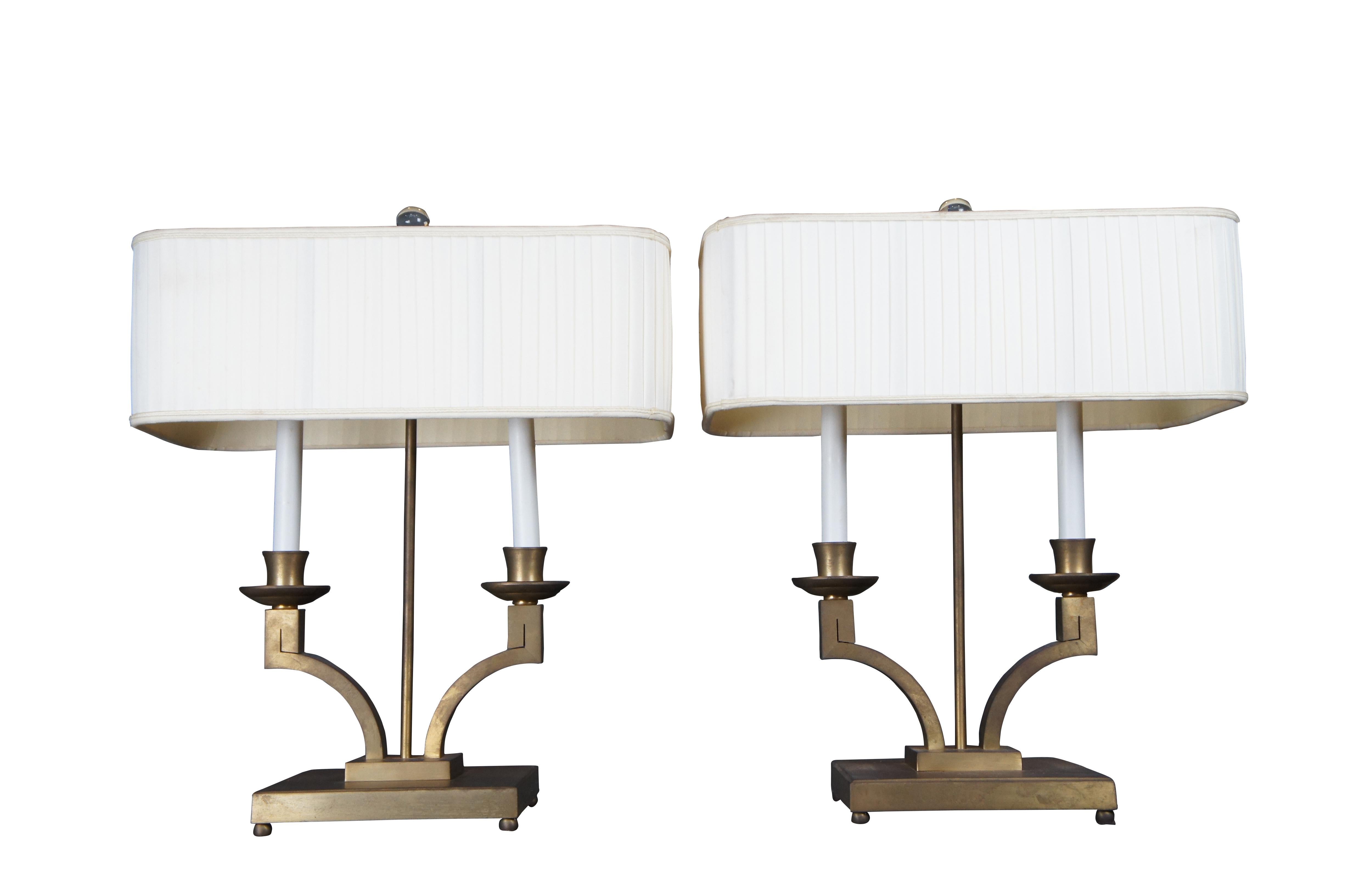 Pair of Modern Laurent Bouillotte double bulb table lamps by Baker Furniture. Part of the Jacques Garcia Collection. Finished in a Champagne colored brass base with curved pleated shade, Murano glass ball finial and round brass