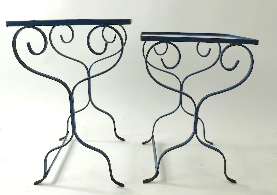 2 Nesting Wrought Iron Tables with Glass Tops Attributed to Salterini In Good Condition In New York, NY
