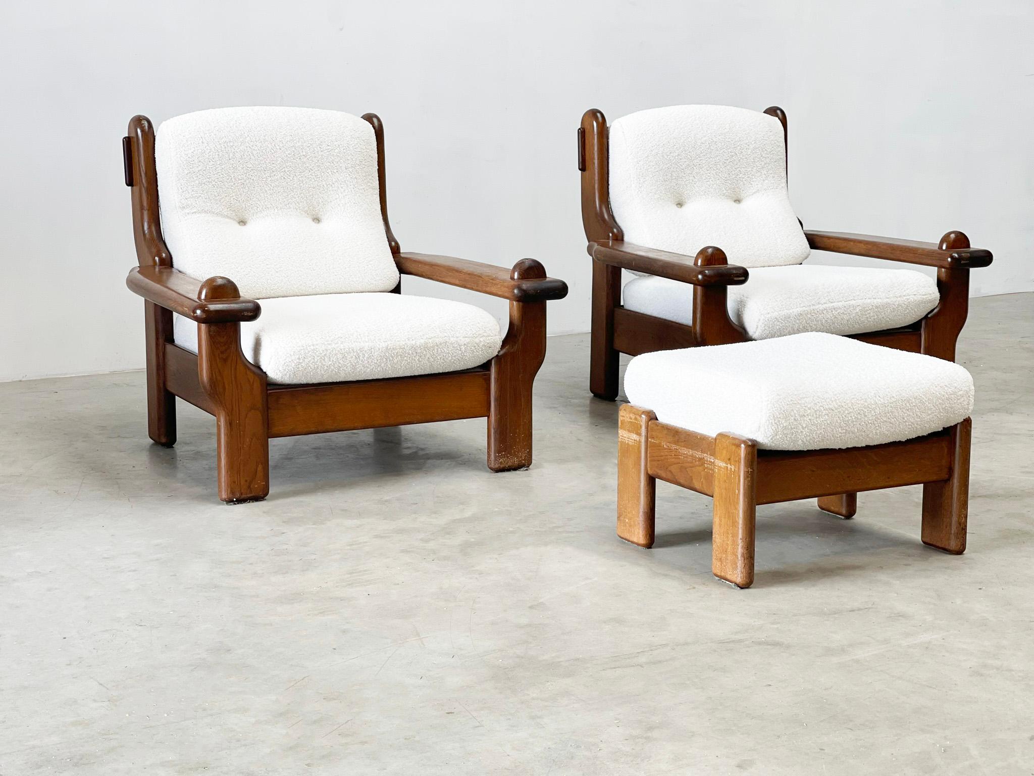 Very nice set of two bombastic lounge chairs. This set is probably made in the Netherlands or Germany. They have a very brutalist frame and heavy frame. This gives them a very good look and fit perfectly in a modern interior. They are reupholstered