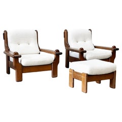 2 oak brutalist french lounge chairs with boucle and ottoman