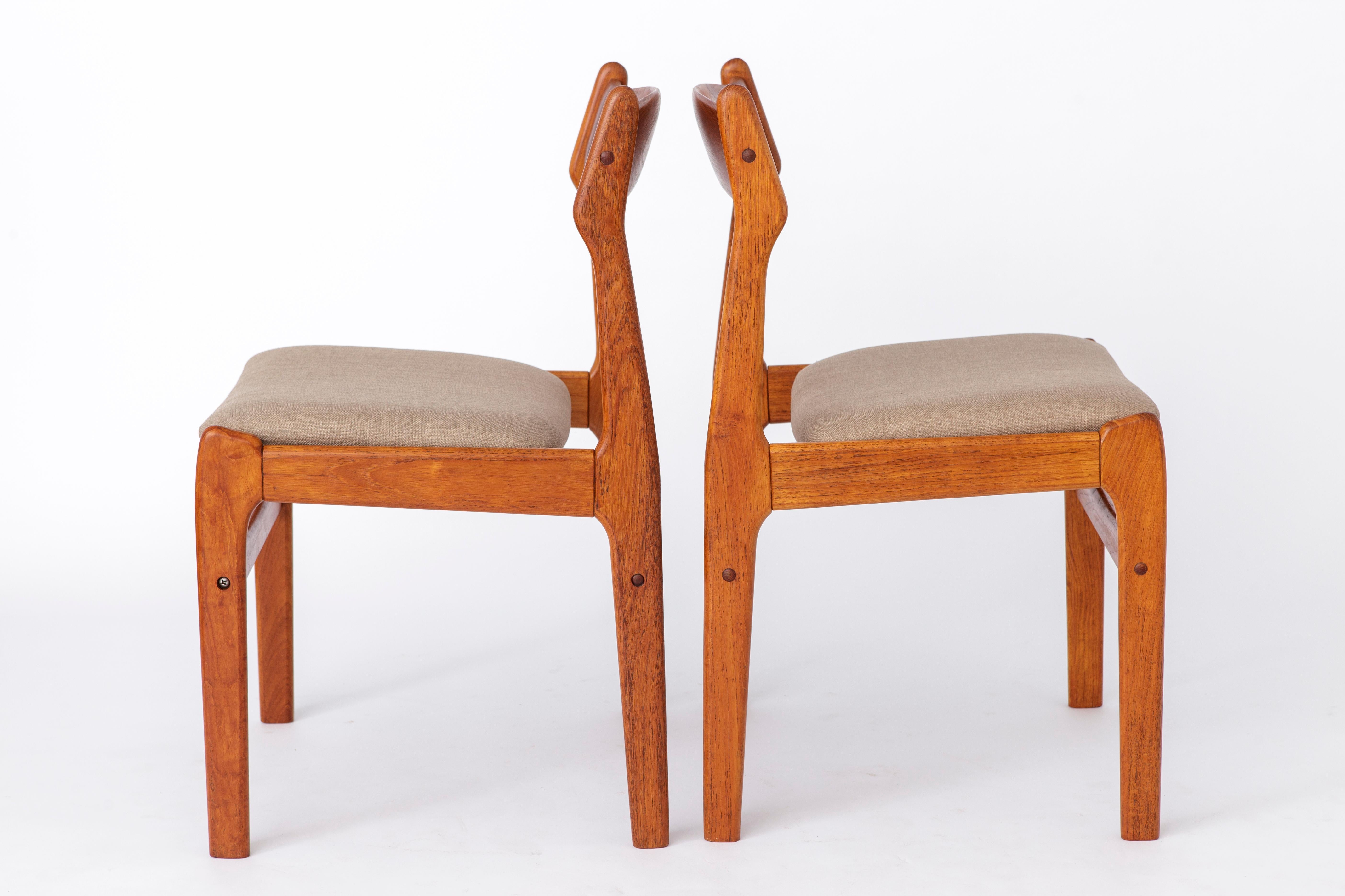 Pair of vintage dining chairs. Unknown manufacturer. 
Origin: Denmark. Production period: approx. 1960s-1970s. 
Displayed price is for 2 chairs. Totally up to 5 available. 

Good vintage condition. Massive walnut chair frames. 
Stable stand, sturdy