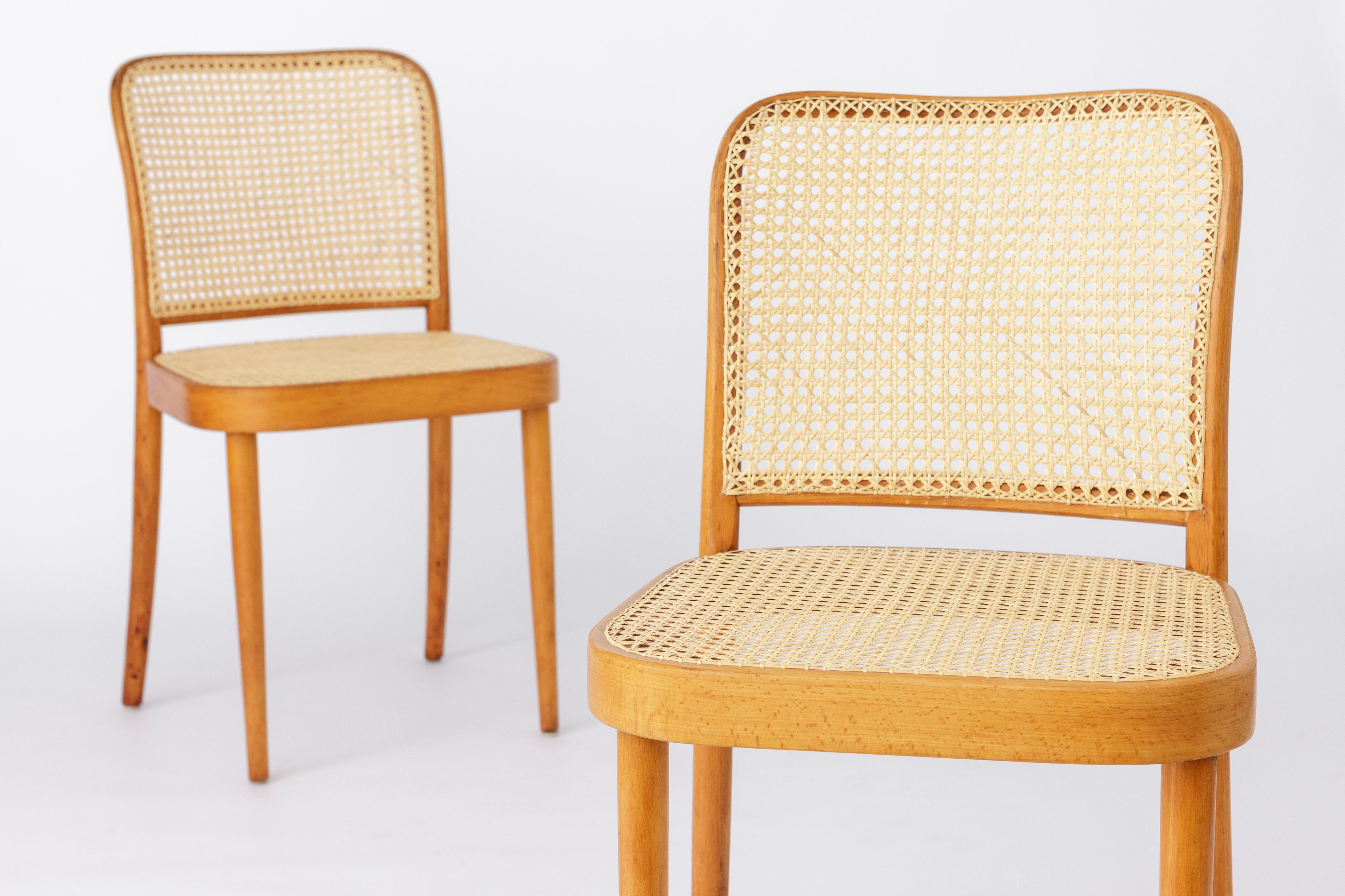 Pair of bentwood chairs from Czechoslovakia by manufacturer Ligna. 
Production period: 1960s-1970s. 
Displayed price is for a set of 2. Totally up to 8 chairs (4 pairs) available. 

Sturdy beech wood frame. Renewed Viennese weaving on seat and back.