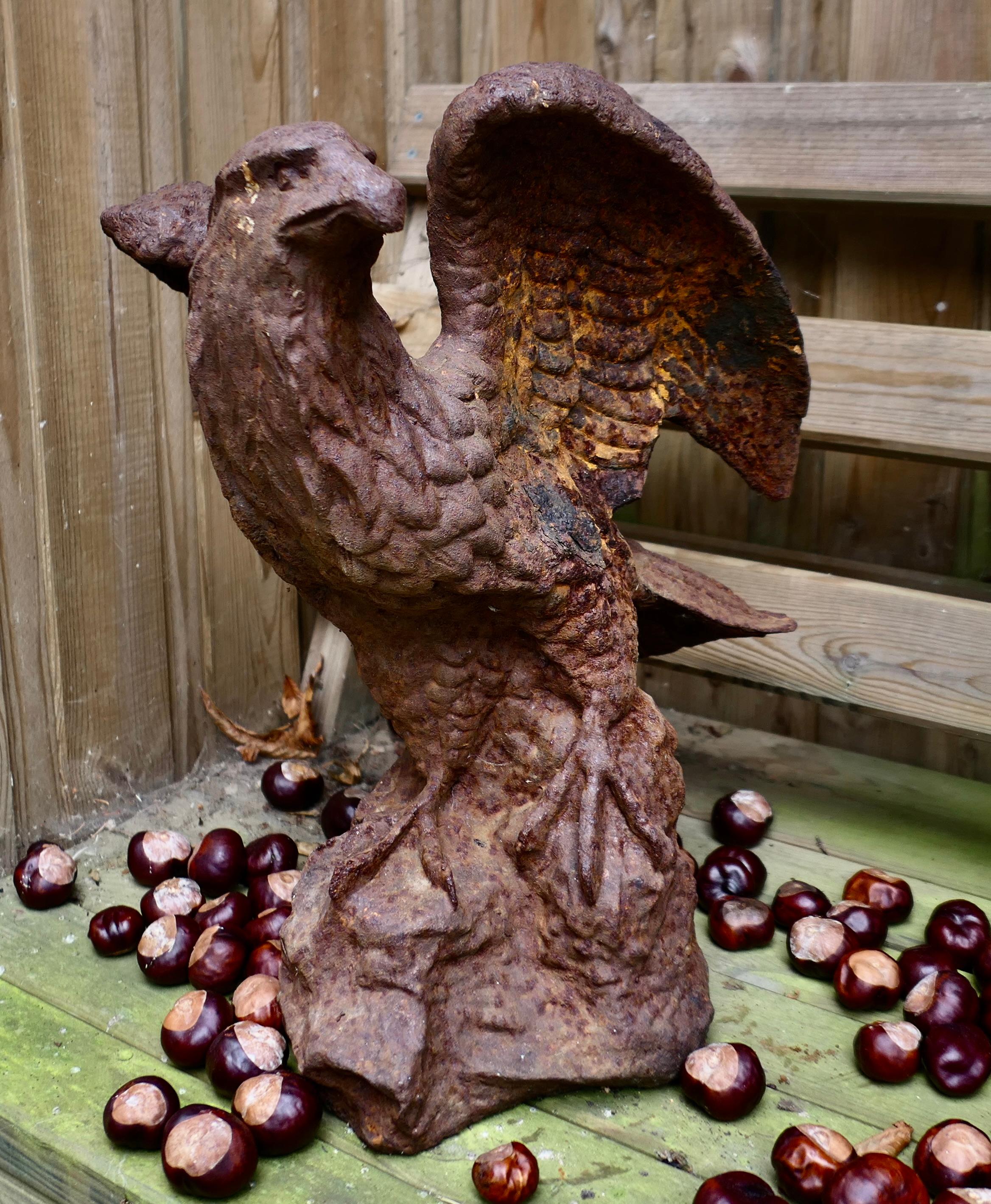 Mid-20th Century 2 Old Weathered Cast Iron Eagle Statues. For Sale