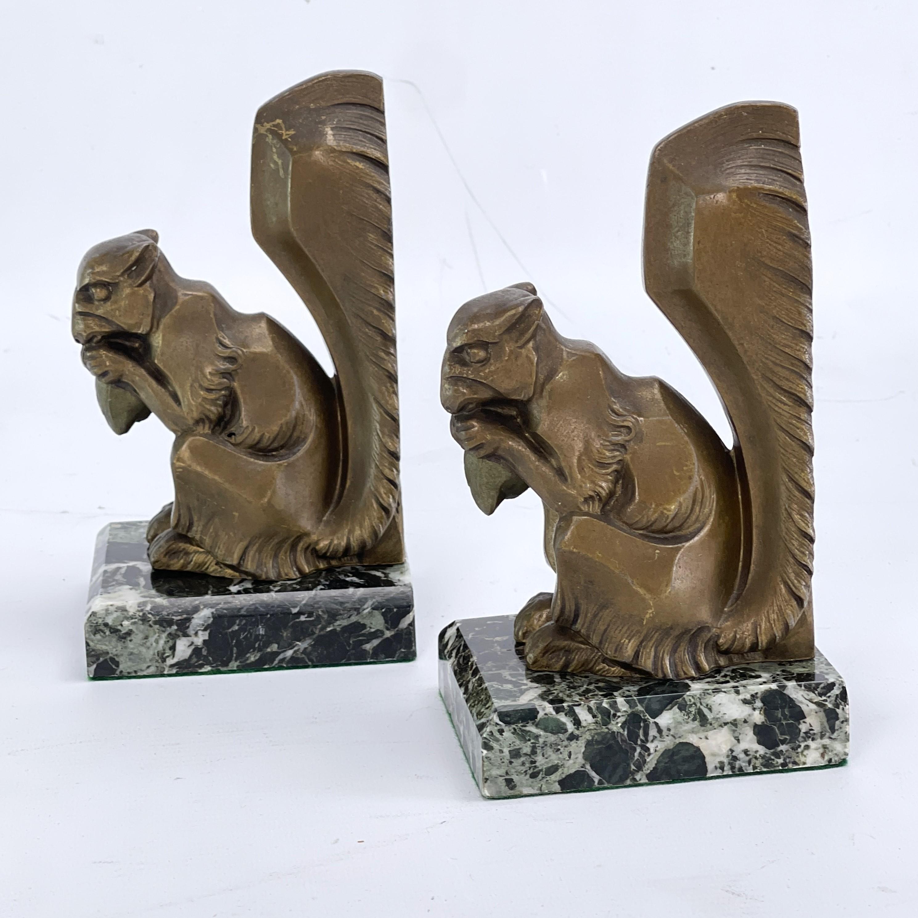 Art Deco squirrel bookends - 1930s

These beautiful squirrelsupports are originals from the 1930s and are typical of the Art Deco period.

Each cleaned item weights 0,9 kg / 2 lbs.
