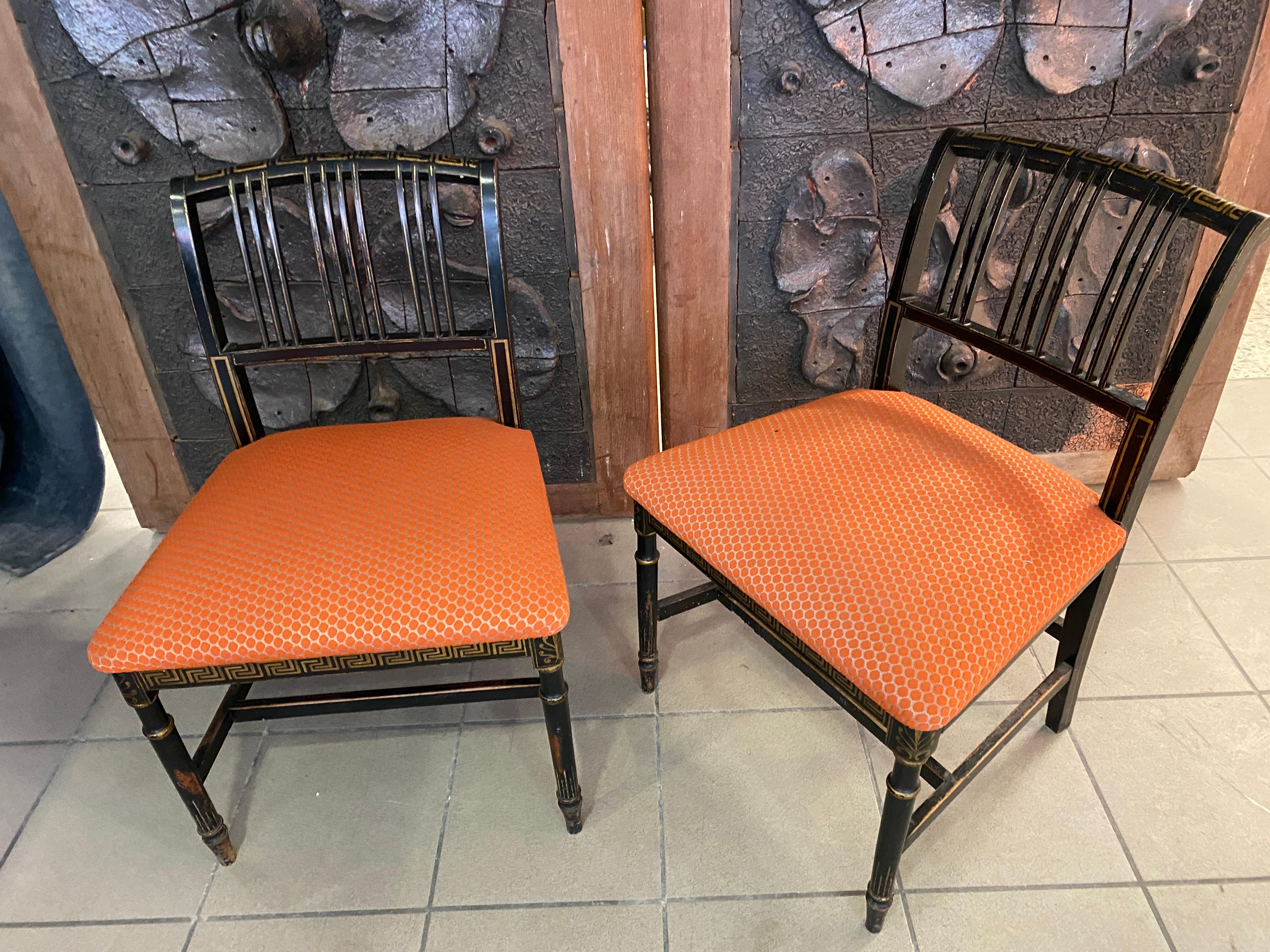 2 original Napoleon III ebonised chairs, France, 1850s
wear and lack of gilding.