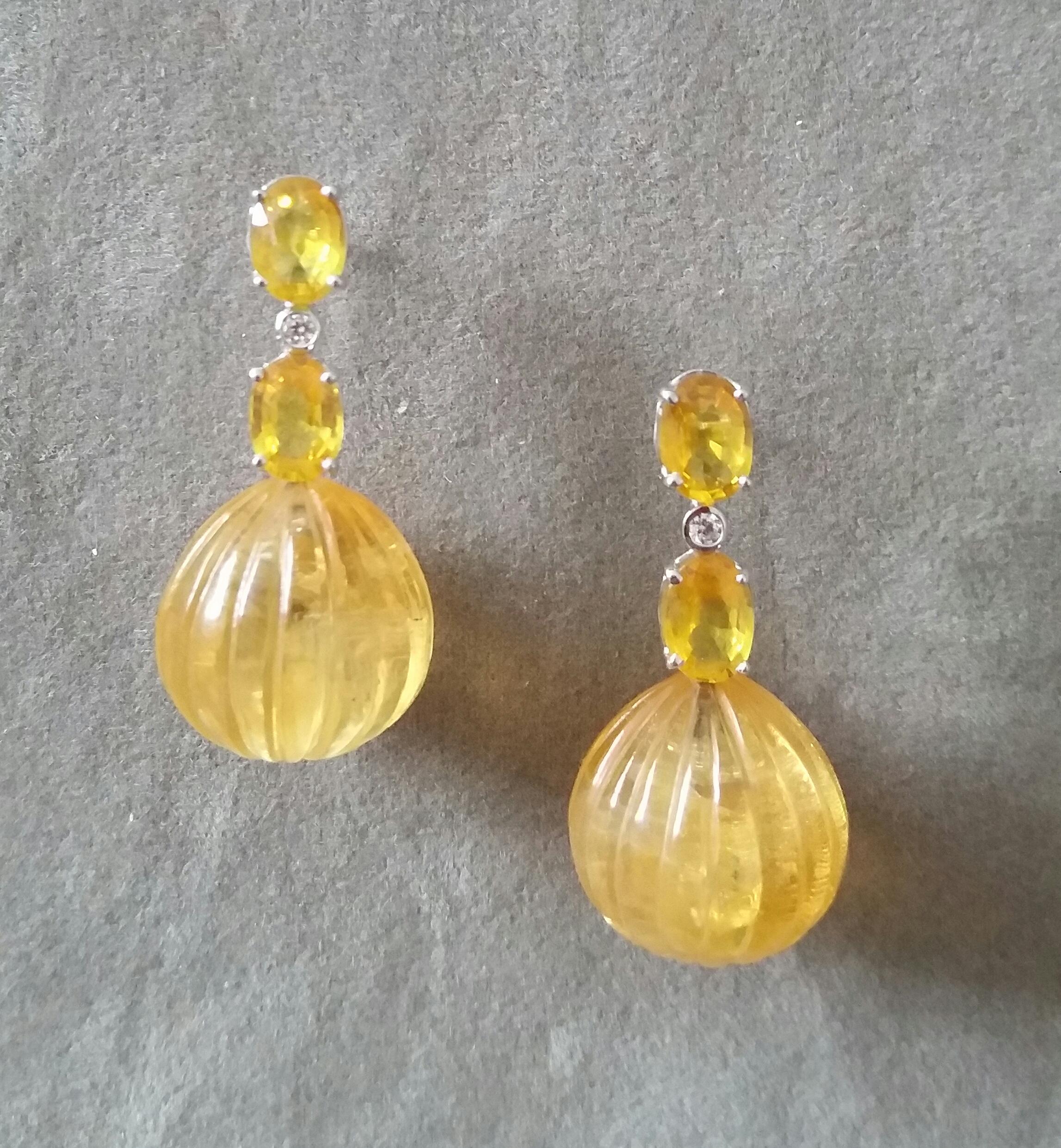 Arts and Crafts 2 Oval Faceted Yellow Sapphires Gold Diamonds Carved Round Citrine Drop Earrings For Sale
