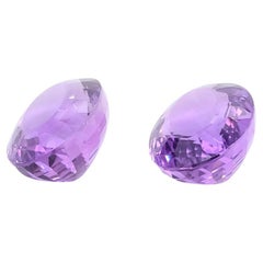 2 Oval-Shaped Amethysts Cts 49.13