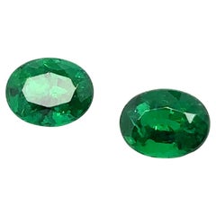 2 Oval-Shaped Emeralds Cts 3.10