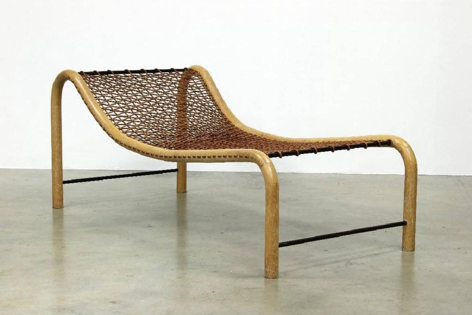 Ultra modern pair of oversized woven leather and bentwood chaise lounges. The finish is a cerused finish. Designed by Important Los Angeles designer William Emmerson.