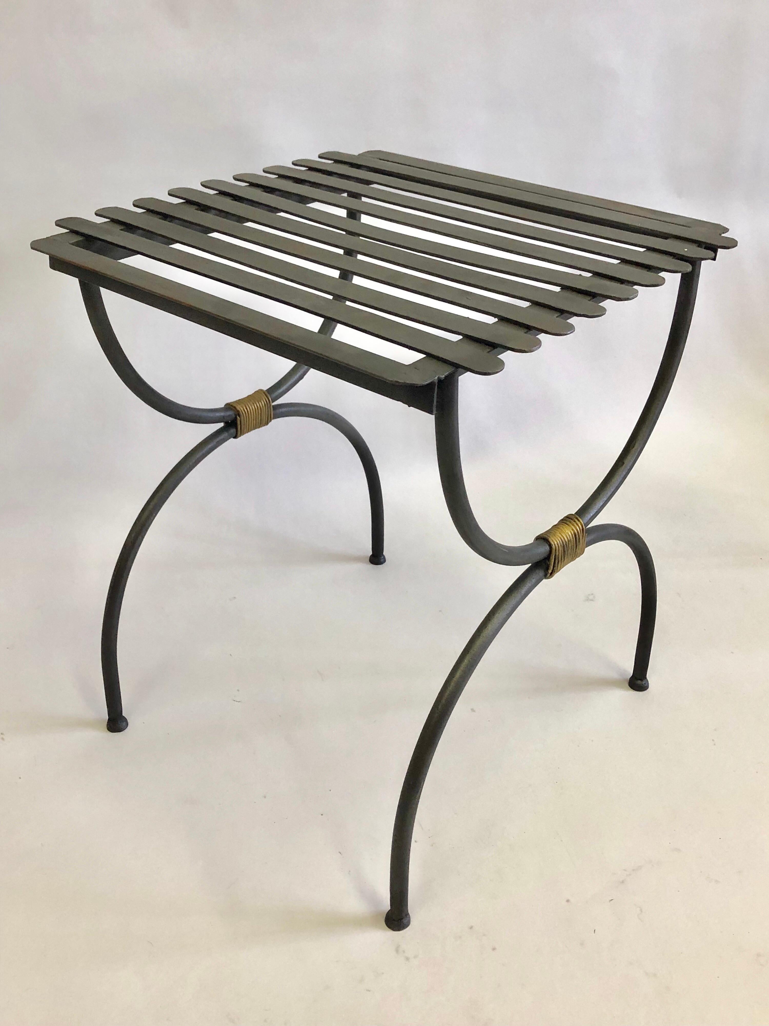 2 pairs of French Mid-Century Modern Neoclassical hand .wrought iron and partially gilt benches, stools or luggage racks circa 1937-1940. The pieces feature a Classic, sober X-form or Curile Form leg structure and the rope wrappings are hand gilt.
