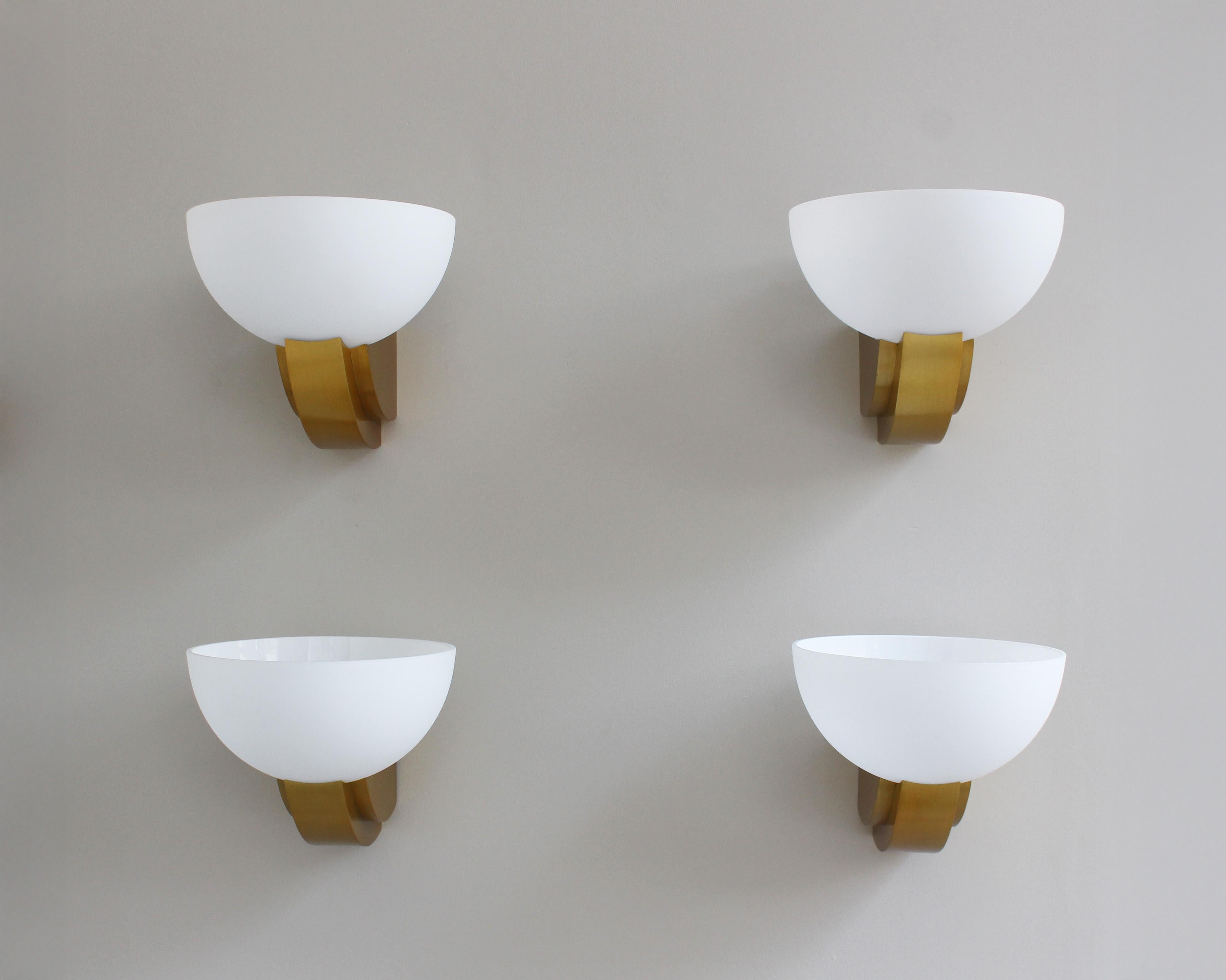 Atelier Jean Perzel - Two pairs of fine French Art Deco Bronze and enameled white glass sconces.

Price is per pair