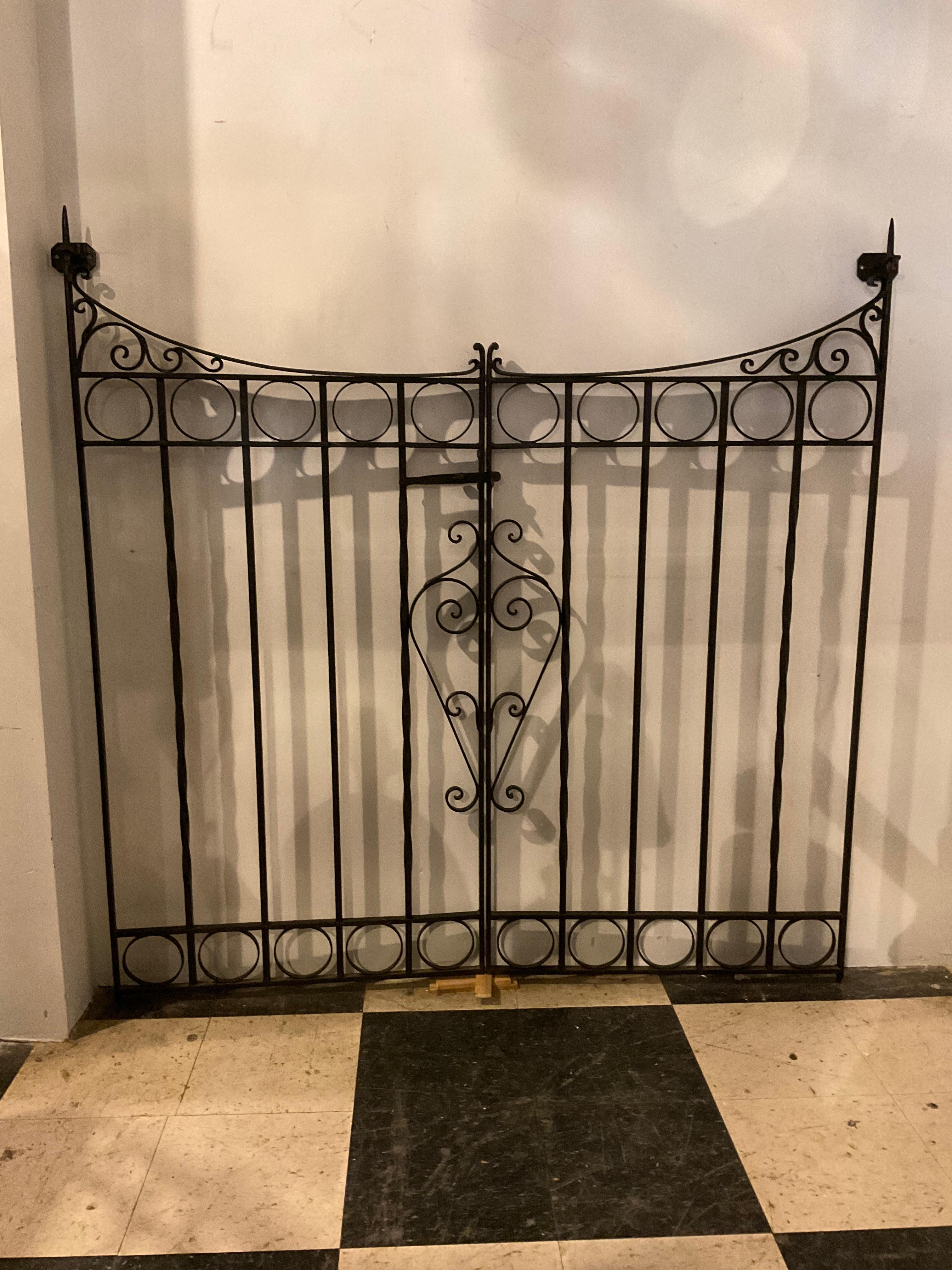 A Pair of wrought iron garden gates. 2 pairs available. Made 70 years ago, kept indoors. One pair, the width is 58”, the other pair, the width is 51”. The price is 1750.00 per pair.
The dimensions of the second pair of gates is …..
H 59.5” W 51”. D