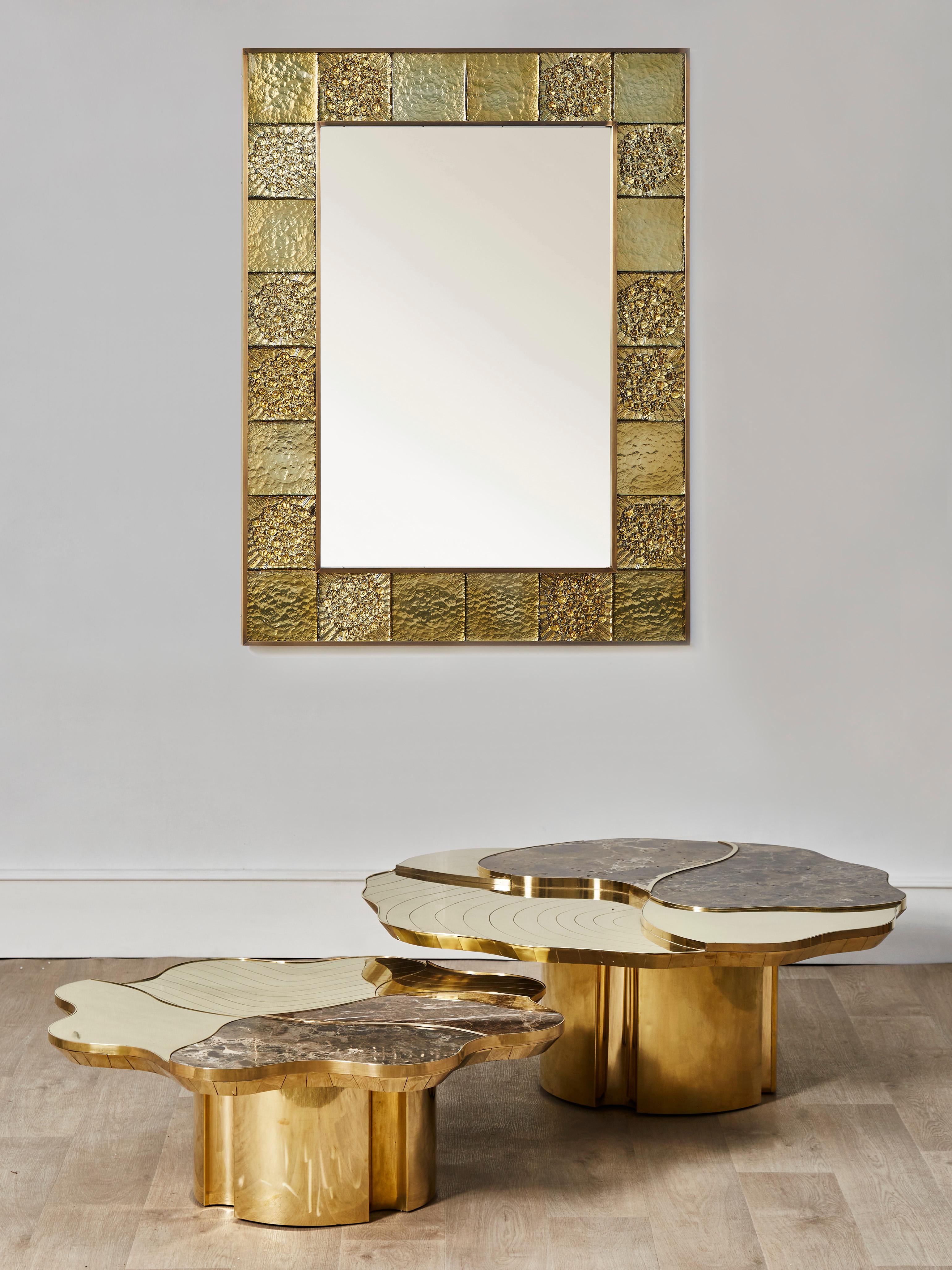 Stunning coffee table in 2 parts with two different heights, made of carved brass and marble stone.
Creation by Studio Glustin.
France, 2021.

Dimensions:
- 108 x 102 x H 37 cm
- 90 x 90 x H 33 cm.