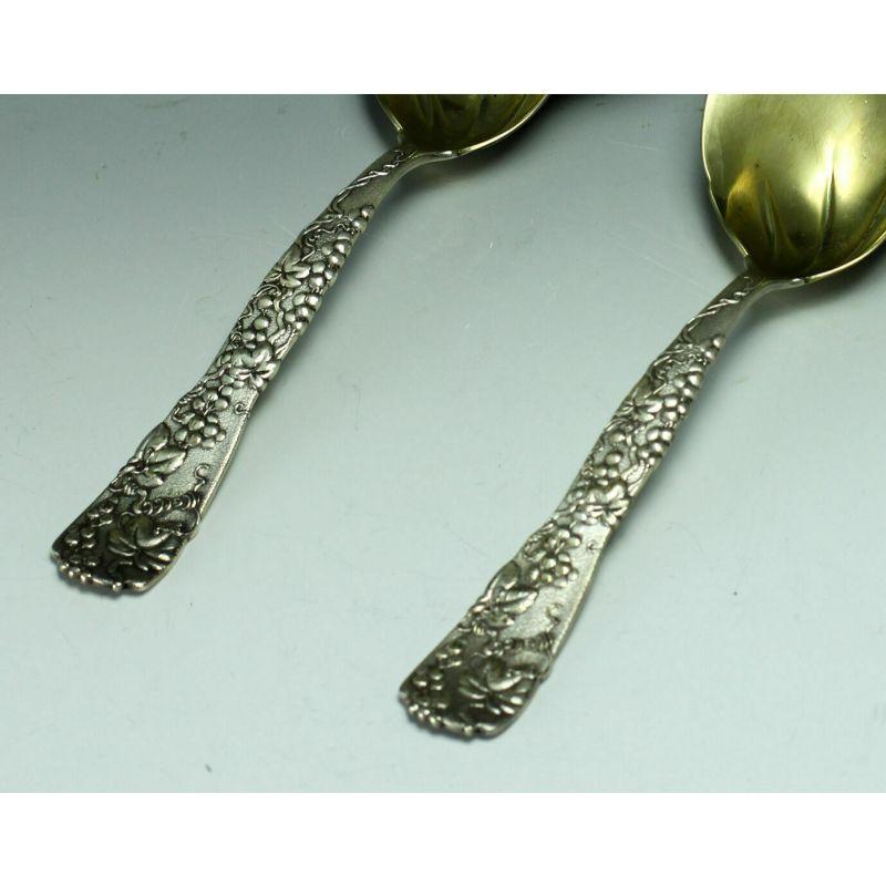 2 Pc Set Tiffany & Co. sterling silver berry server Spoons in Original Box, circa 1923.

2pc Set circa 1923 Sterling Silver Berry Server Spoons Tiffany & Co. in Original Box - High relief grape vine and Conch pattern. The bowl of each spoon is