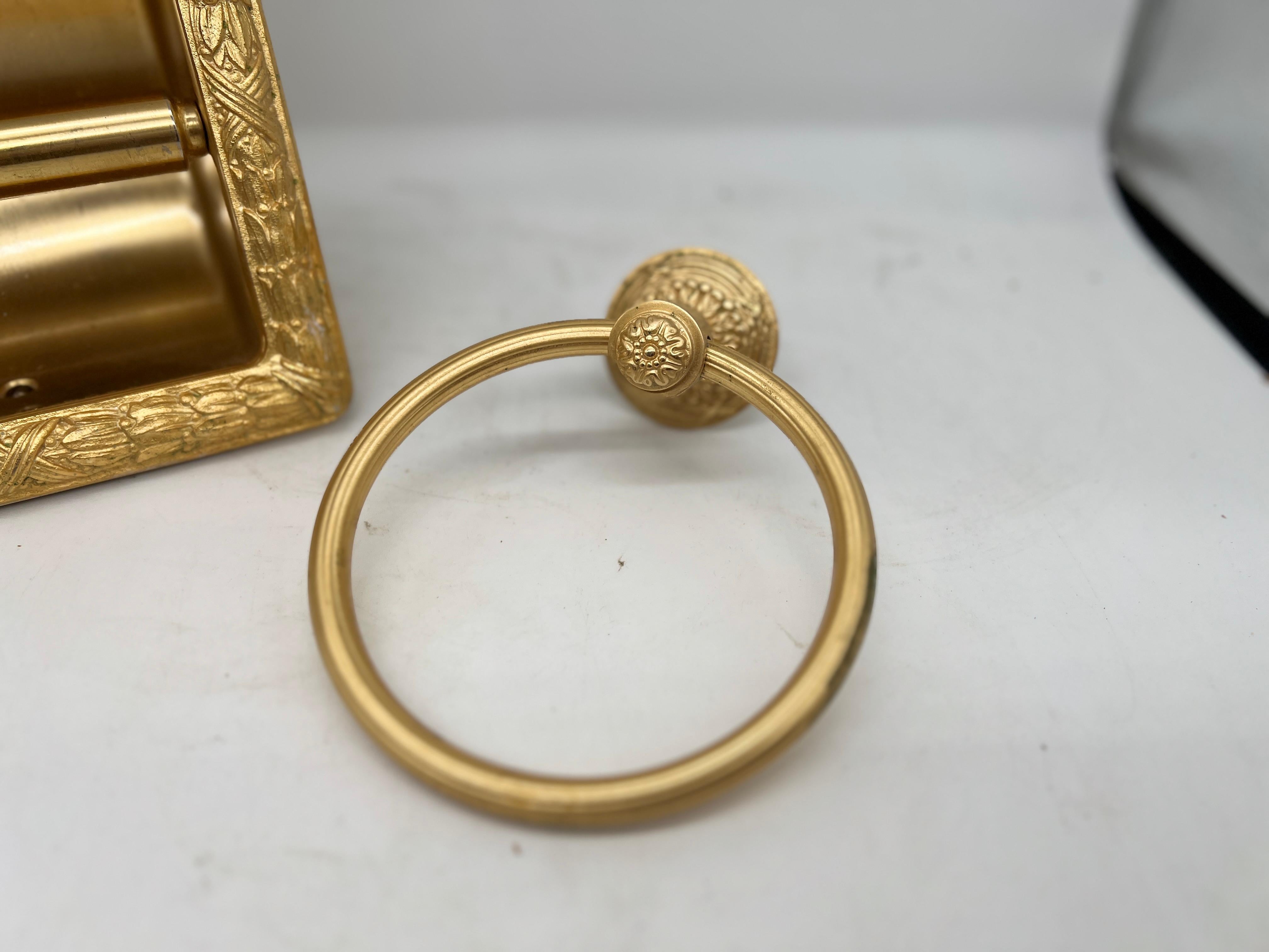 2-Piece Vintage Sherle Wagner Bathroom Set
Ribbon & Reed Pattern, Gold-Plated Recessed Paper Holder and Towel Ring

This elegant 2-piece bathroom set by Sherle Wagner epitomizes the brand's timeless luxury and meticulous craftsmanship. Featuring the