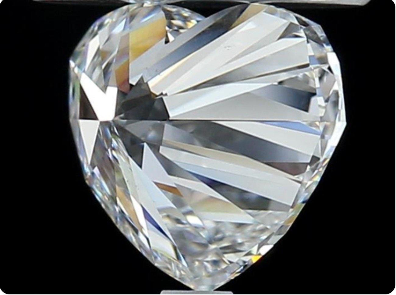 Pair of natural and ideal Heart shape diamonds diamonds in a 0.60 total carat weight DE SI1 Ideal cut Heart with GIA Certificate and laser inscription number.

GIA 2416279309 & 2418278658

Sku: 591 & 599
