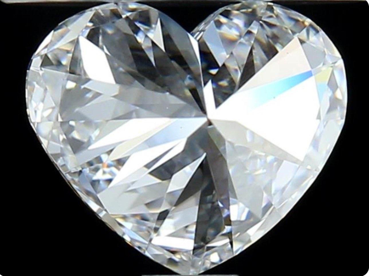 Pair of ideal and brilliant heart shape natural diamonds in a 0.60 total carat weight F SI1 Ideal cut Heart with GIA Certificate and laser inscription number.

GIA 1413278594 & 1403432687

Sku: 579 & 893