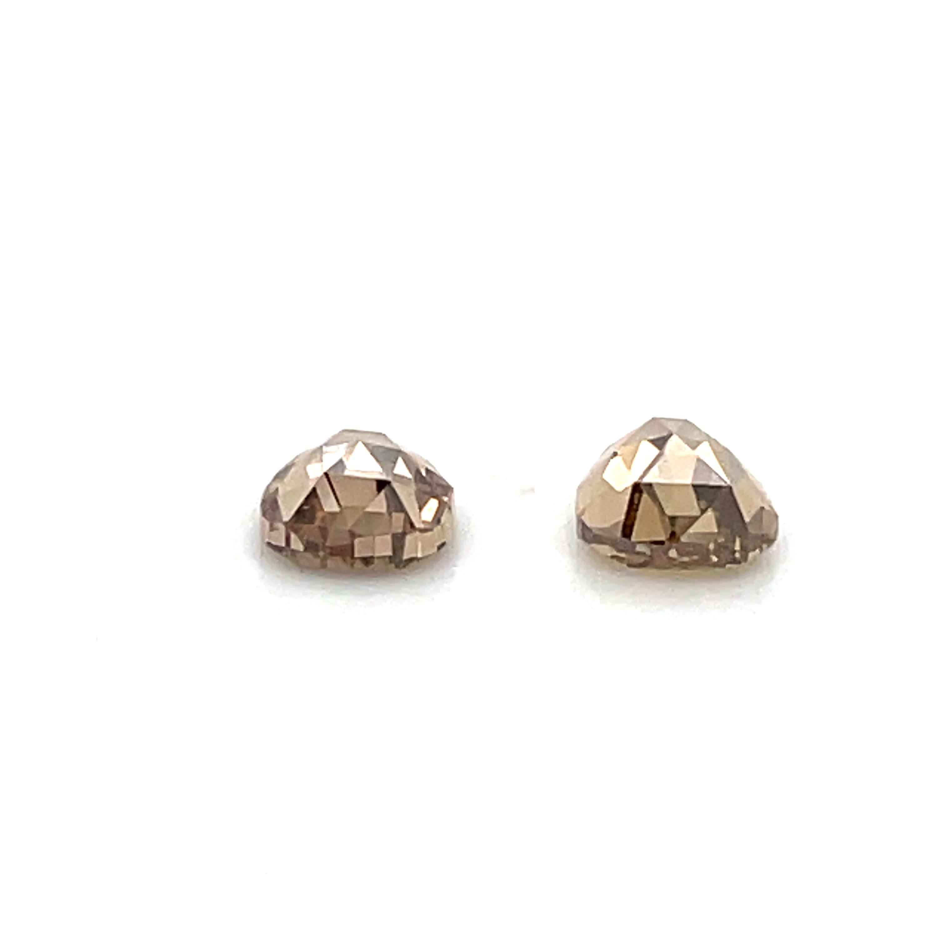 Introducing a stunning pair of pear-shaped, 2.05-carat brown diamonds.

Many believe that the significance of these brown diamonds is related to stability and strength.

They are a great option for anyone looking for something unique and