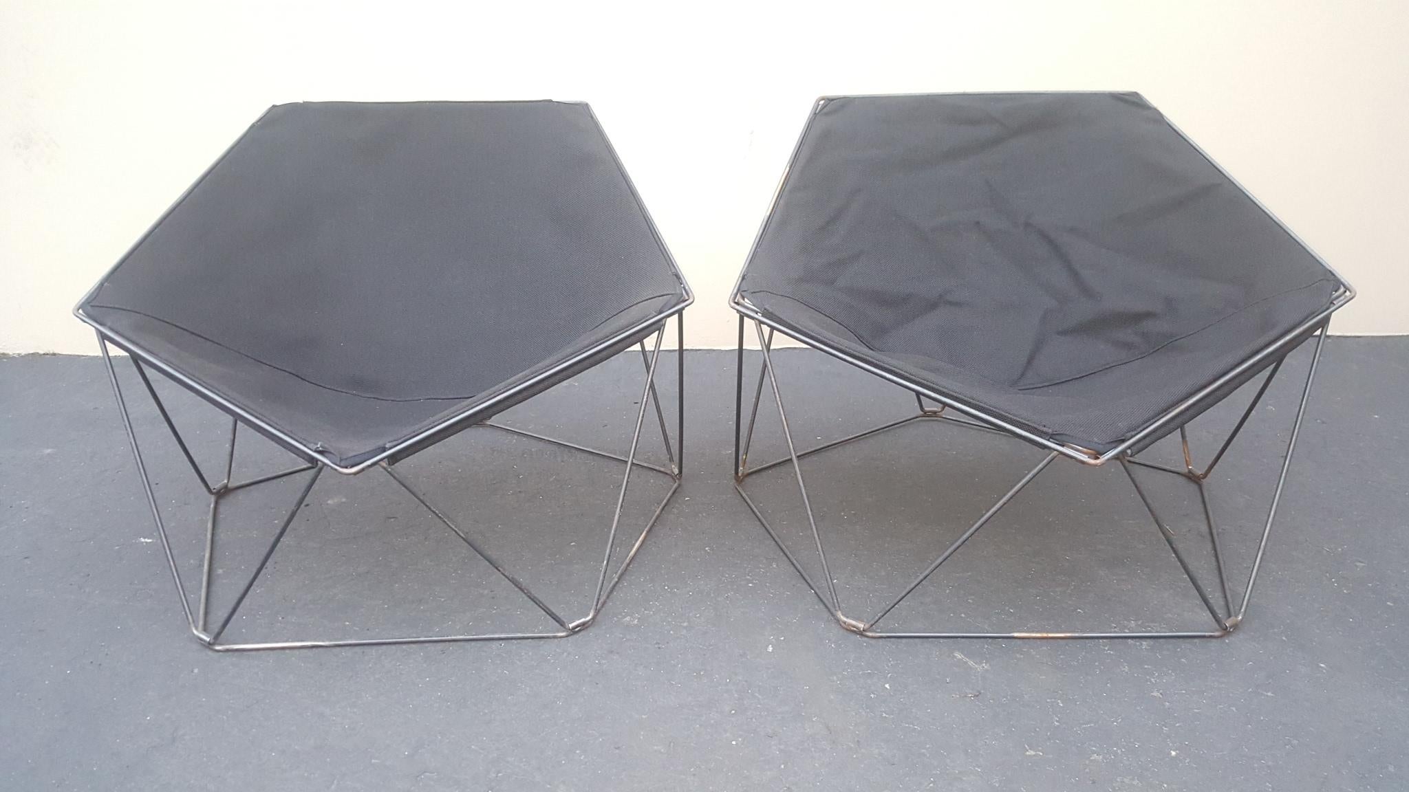 1960s French Mid-Century Modern penta lounge chairs designed by Jean-Paul Barray And Kim Moltzer for Wilhem Bofinger.

2 Penta lounge chairs, black canvas slings, pentagonal collapsible frames.

These sexy 1960s French Mid-Century Modern lounge