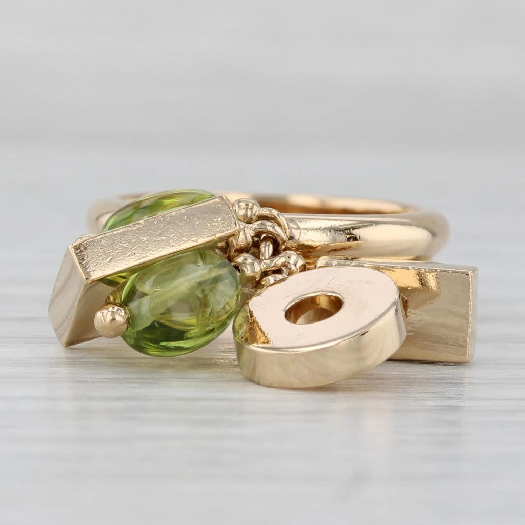 2 Peridots Abstract Charm Ring 18k Yellow Gold Size 6 Cocktail Dolce In Good Condition For Sale In McLeansville, NC