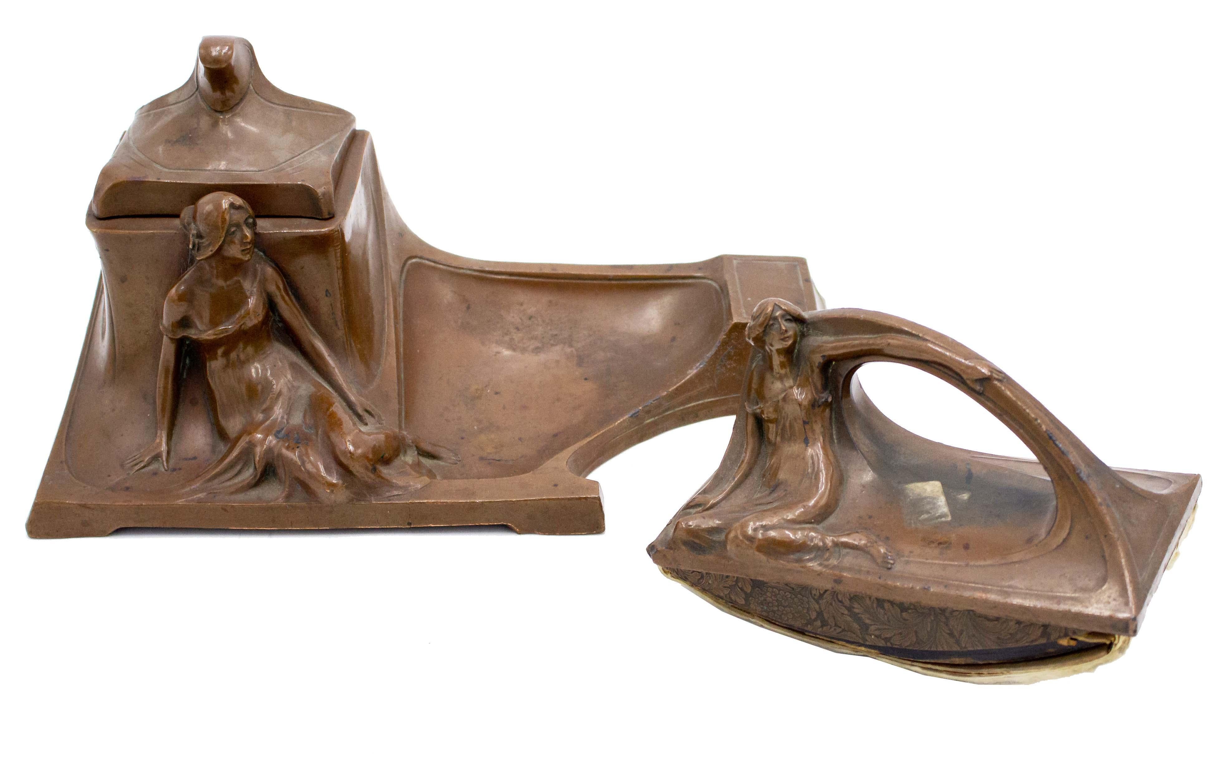 French Art Nouveau 2 piece copper inkwell and roll blotter with open handle with reclining ladies. (priced as set).   
  