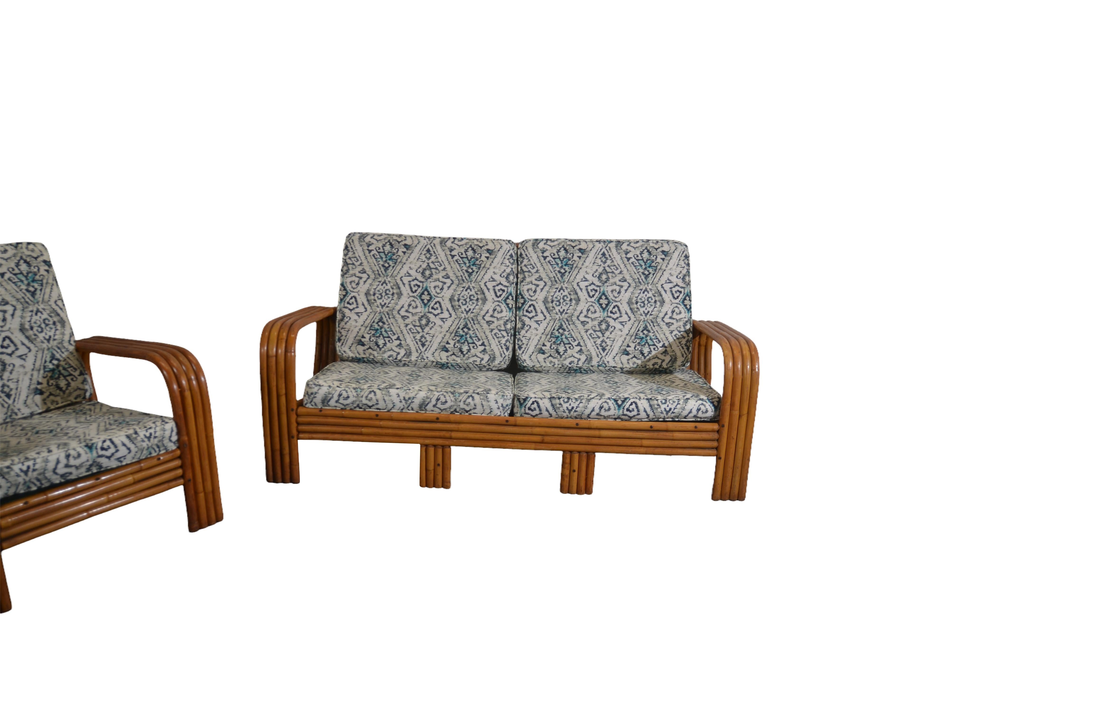 Mid-century bamboo loveseat and lounge chair. 
The cushions have been recovered.
Lounge Chair Dimensions: 31