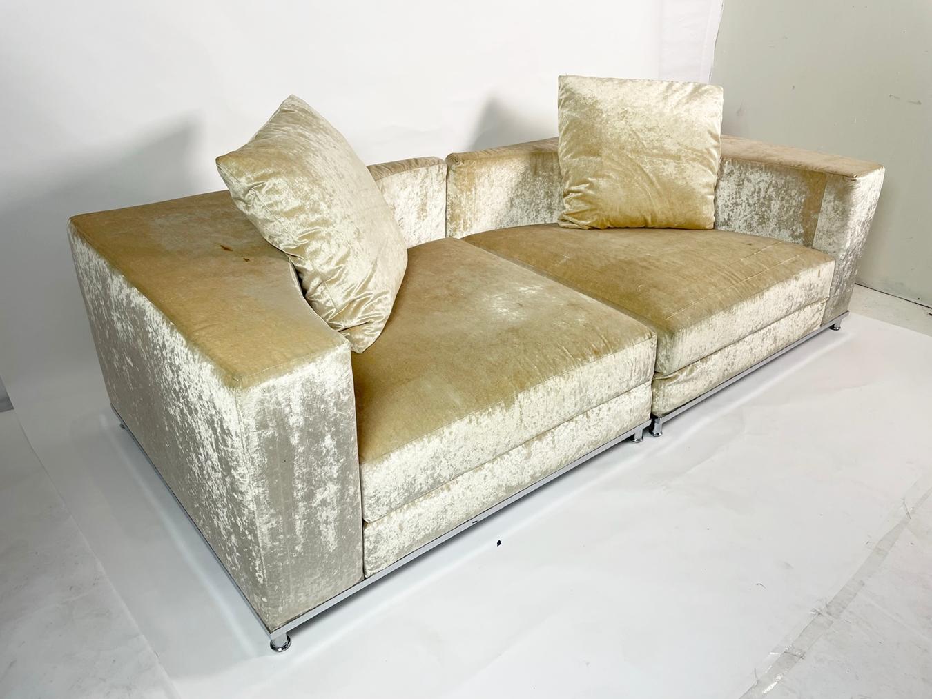2 piece sectional sofa designed and manufactured in Italy by Saba Italia.

The sofa has a chrome base with removable cushions and it comes with 2 pillows, a very modern and cool take on sectional seating.

The sofa is not longer in