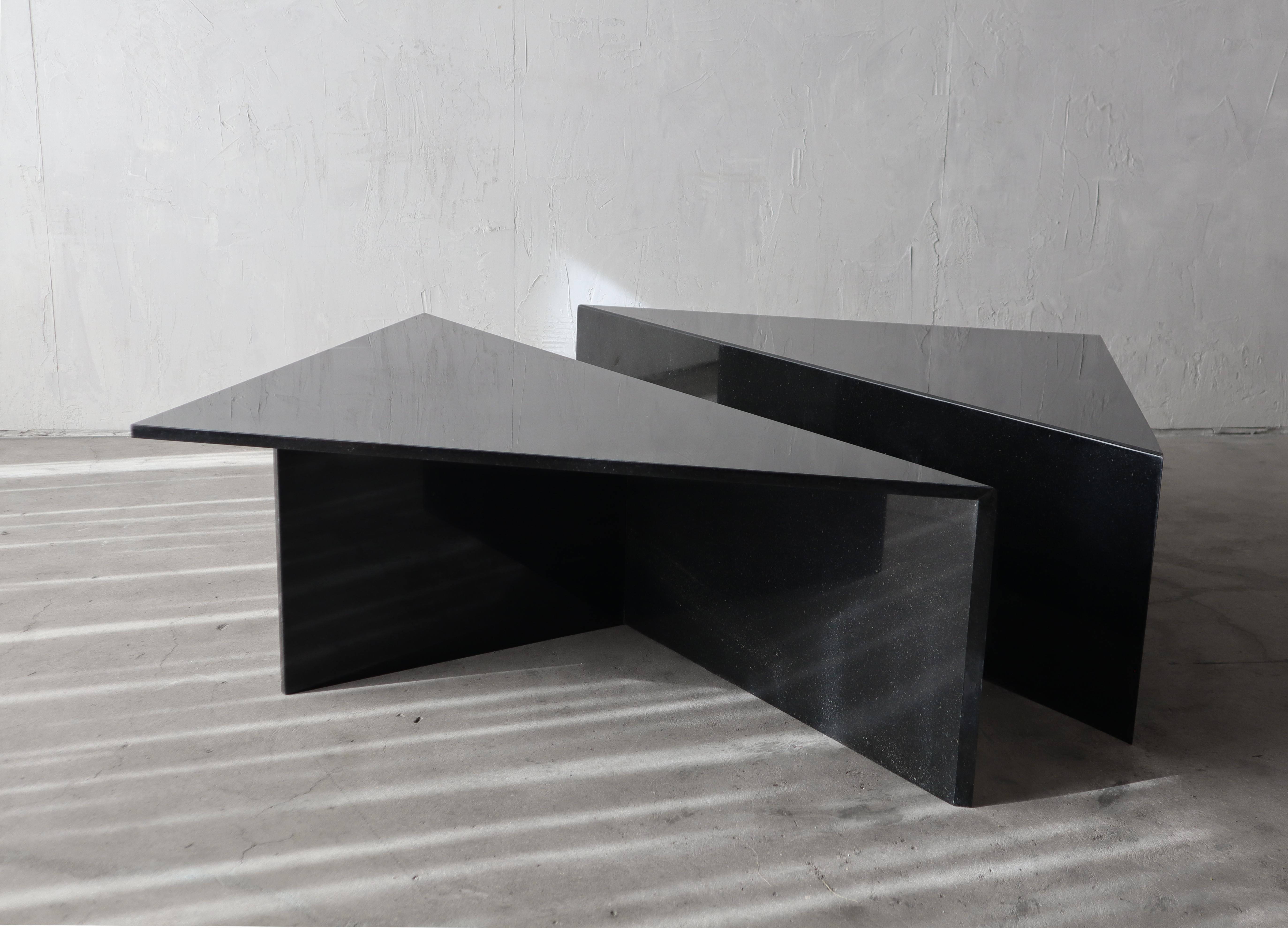 If you've been looking for a Monumental coffee table of epic proportions, Look no further. This gorgeous 2 piece Postmodern granite triangular coffee table is massive. Simple beautiful piece. Table is of modernist and minimal design, comprised of 2