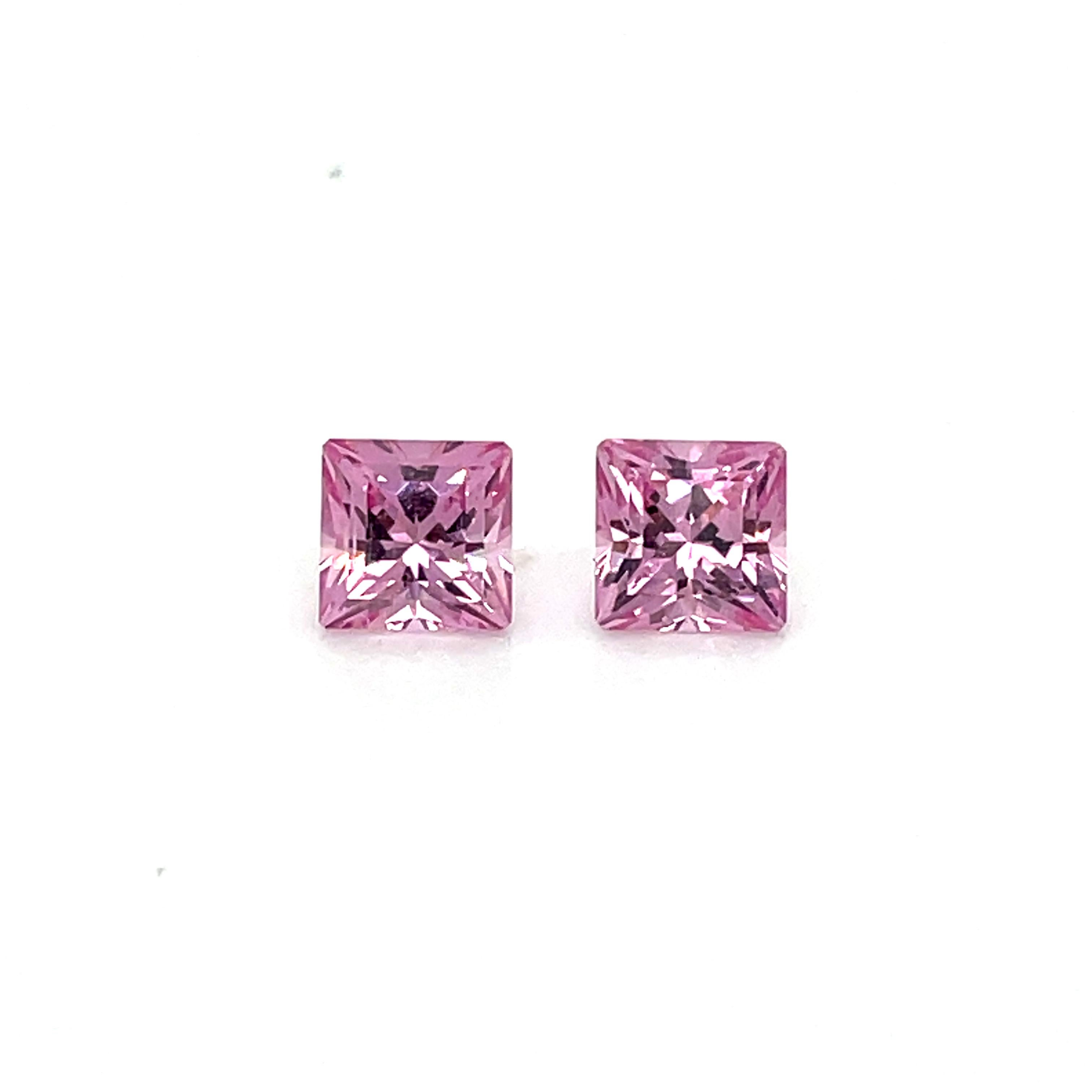 Get ready to be mesmerized by these exquisite gems' unmatched beauty. 

With a total carat weight of 2.18, these pink spinel princess-cut stones are a rare find indeed. 

They stand out from the crowd with their vivid pink color and precise princess