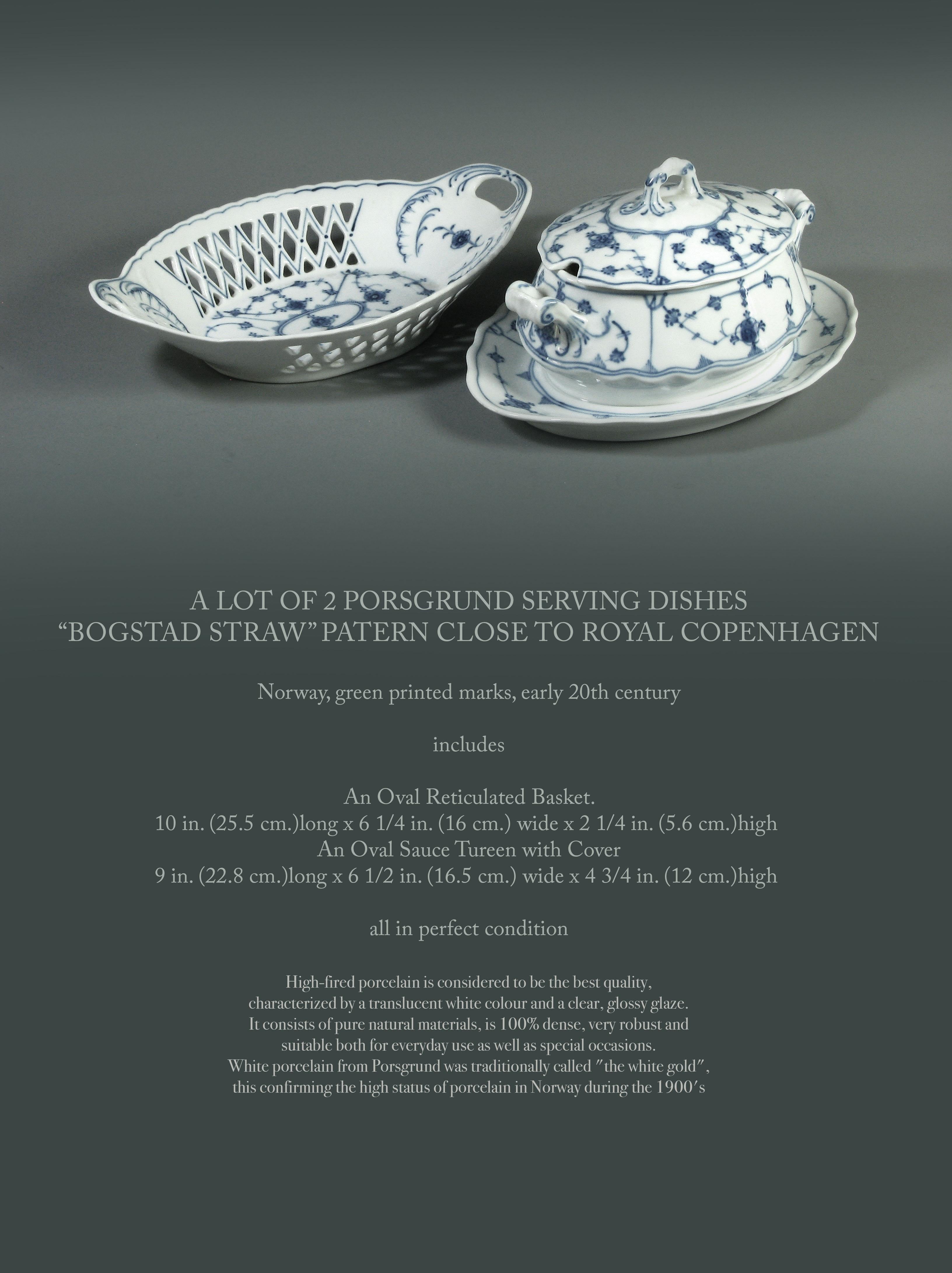 A LOT OF 2 PORSGRUND SERVING DISHES
“Bogstad Straw” patern close to Royal Copenhagen

Norway, green printed marks, early 20th century.

Includes;

An Oval Reticulated Basket.
10