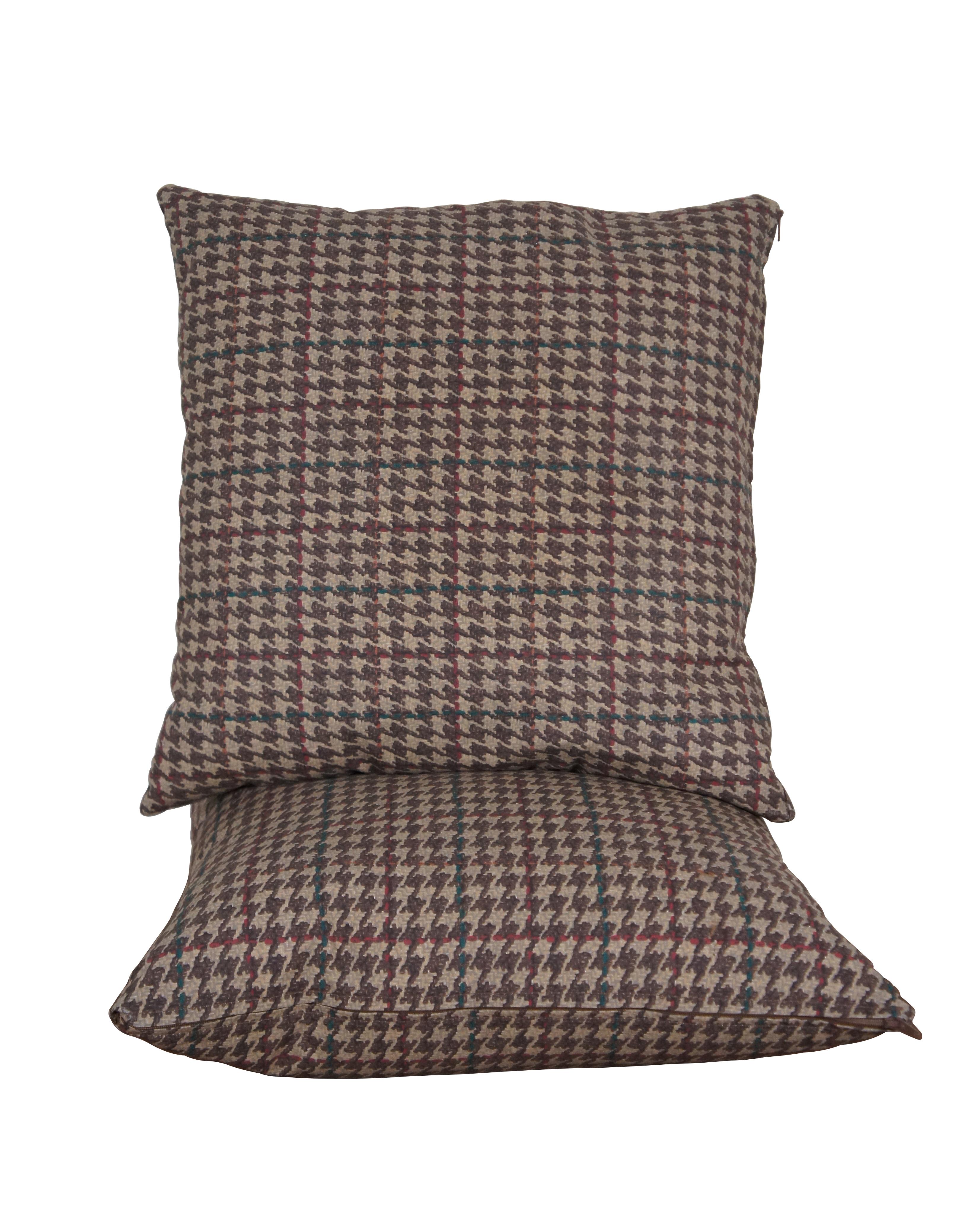 Pair of late 20th century Ralph Lauren down filled throw pillows. Two tone brown houndstooth plaid with red and green stripes. 100% cotton shell. White Goose Down filled. Made in the USA. Dry clean only.


Dimensions:
16