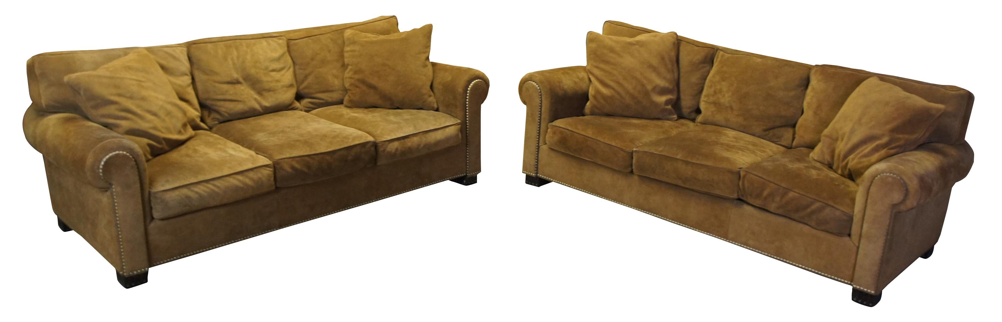 Pair of two vintage Ralph Lauren Henredon Jamaica Salon three seat sofas. Inspired by elegant island living, the Jamaica salon sofa provides plush, comfortable seating with a small-scale profile. Resting on low reeded block feet with gentle roll