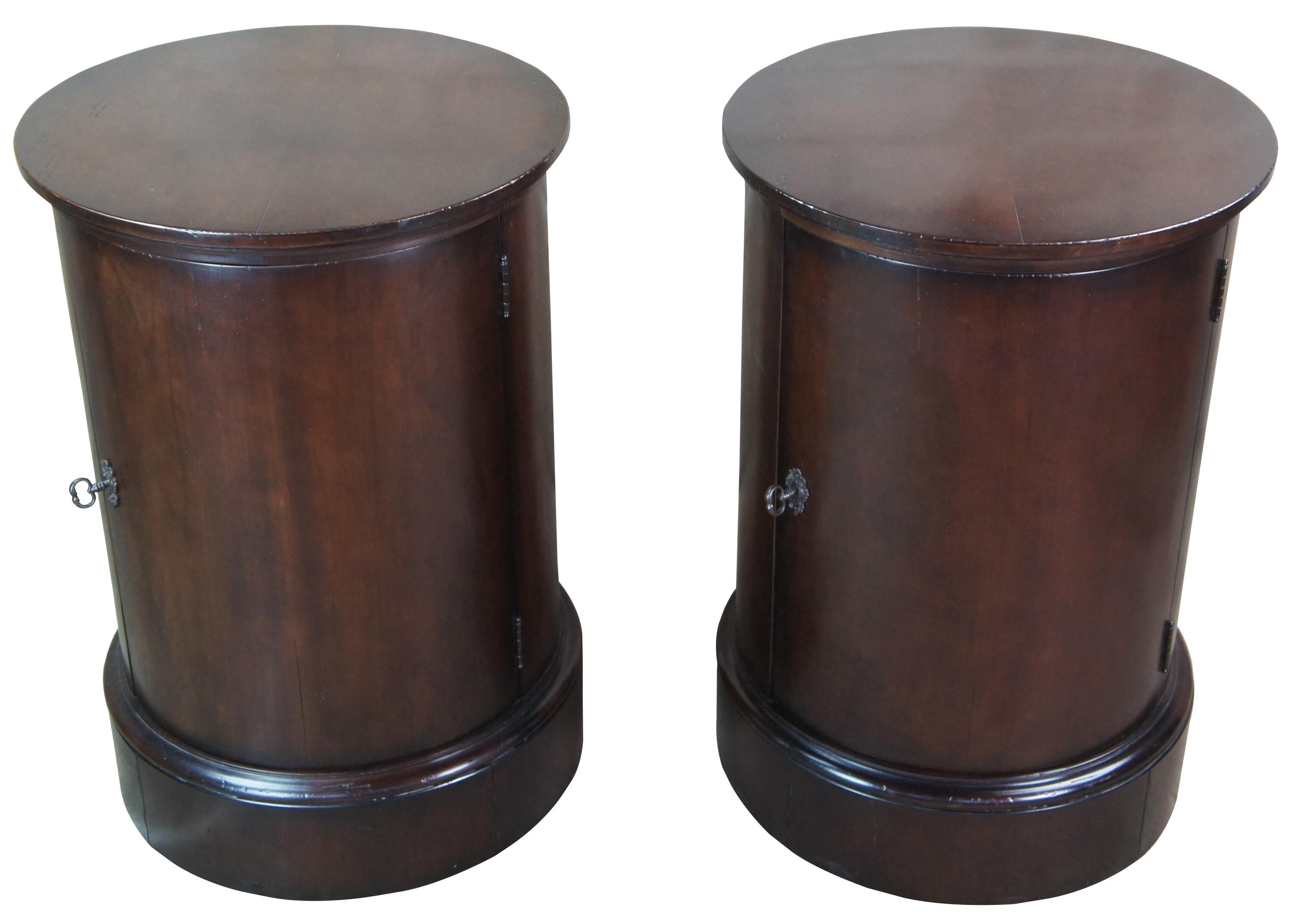 Two Ralph Lauren drum table or somno cabinets. Made of mahogany featuring round form with lower cabinet.

Ralph Lauren was one of several design leaders raised in the Jewish community in the Bronx, along with Calvin Klein and Robert